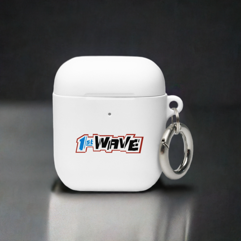 White AirPods case with a '1st WAVE' logo and a silver keychain attached on a reflective metal surface.