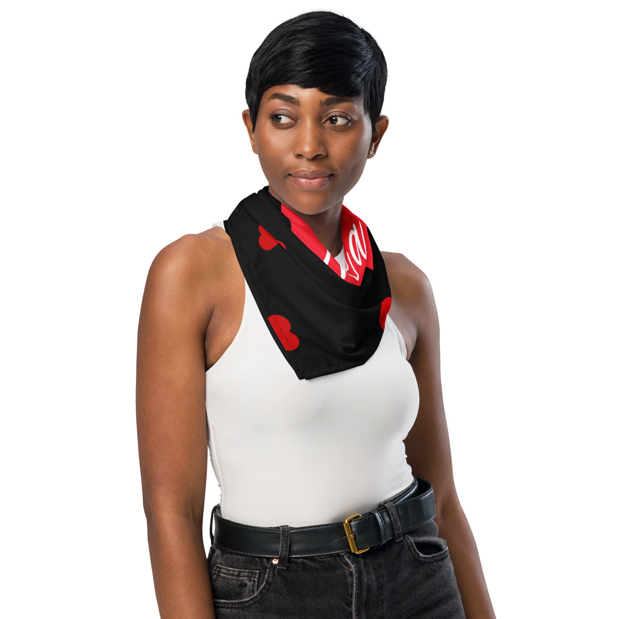 A female model wears a black, red and white patterned bandana around her neck.  Red hearts and partial white text is visible. 