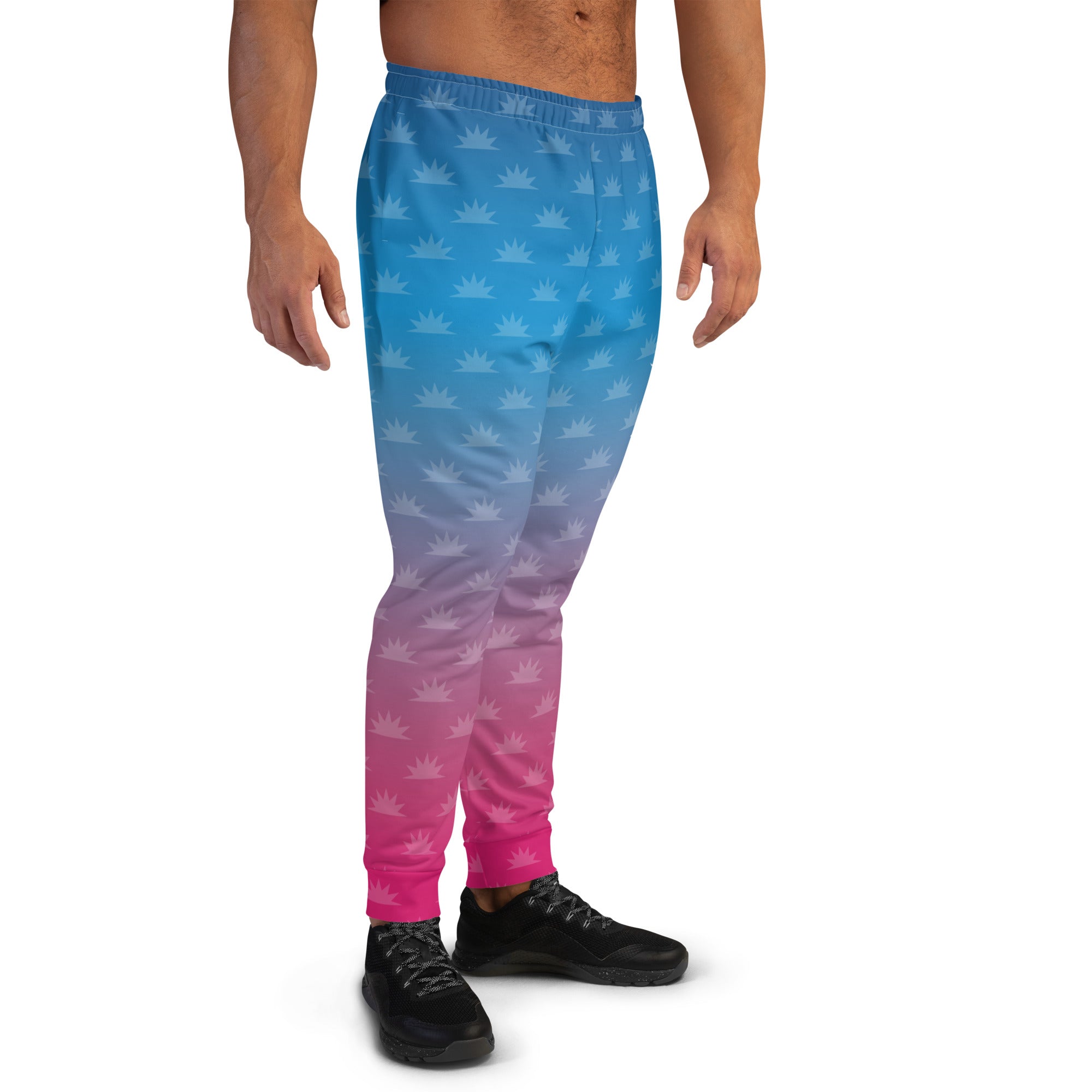 Gradient blue and pink joggers with a crown pattern and the logo 'THE MORNING MASHUP' printed on the side.