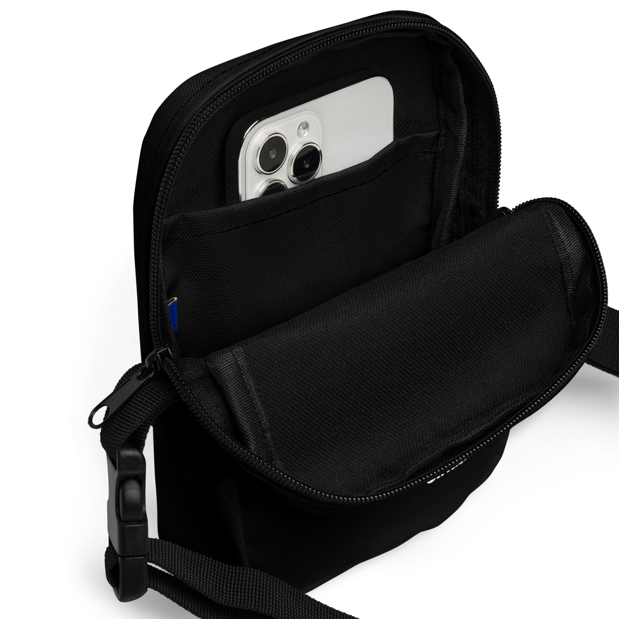 A close-up view of the SiriusXM utility bag’s interior, showing multiple storage compartments, including a secure pocket for a smartphone.