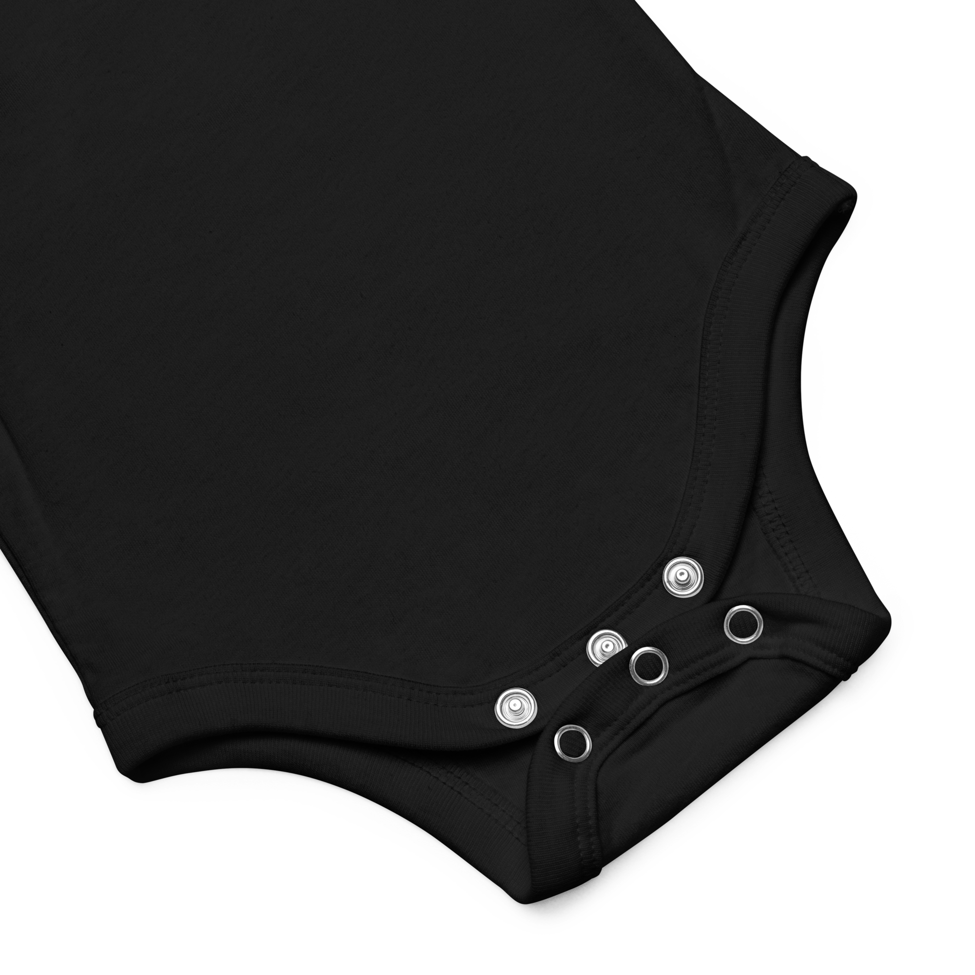 Black onesie with snap buttons at the bottom on a dark background.