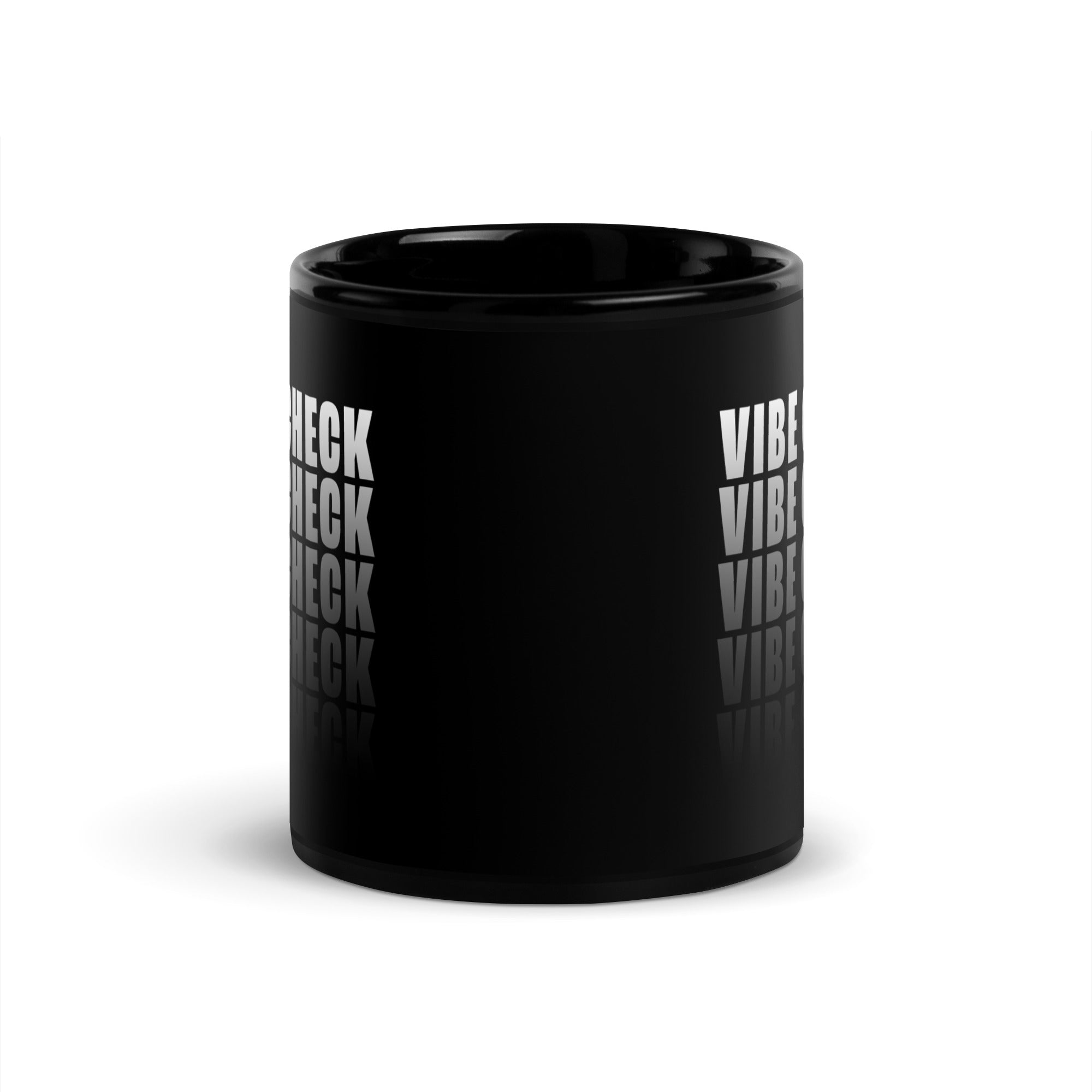 A black glossy coffee mug featuring bold white text that reads 'VIBE CHECK' in a stacked, repeating pattern with a reflection effect at the bottom. Opposite view from mug's handle. 