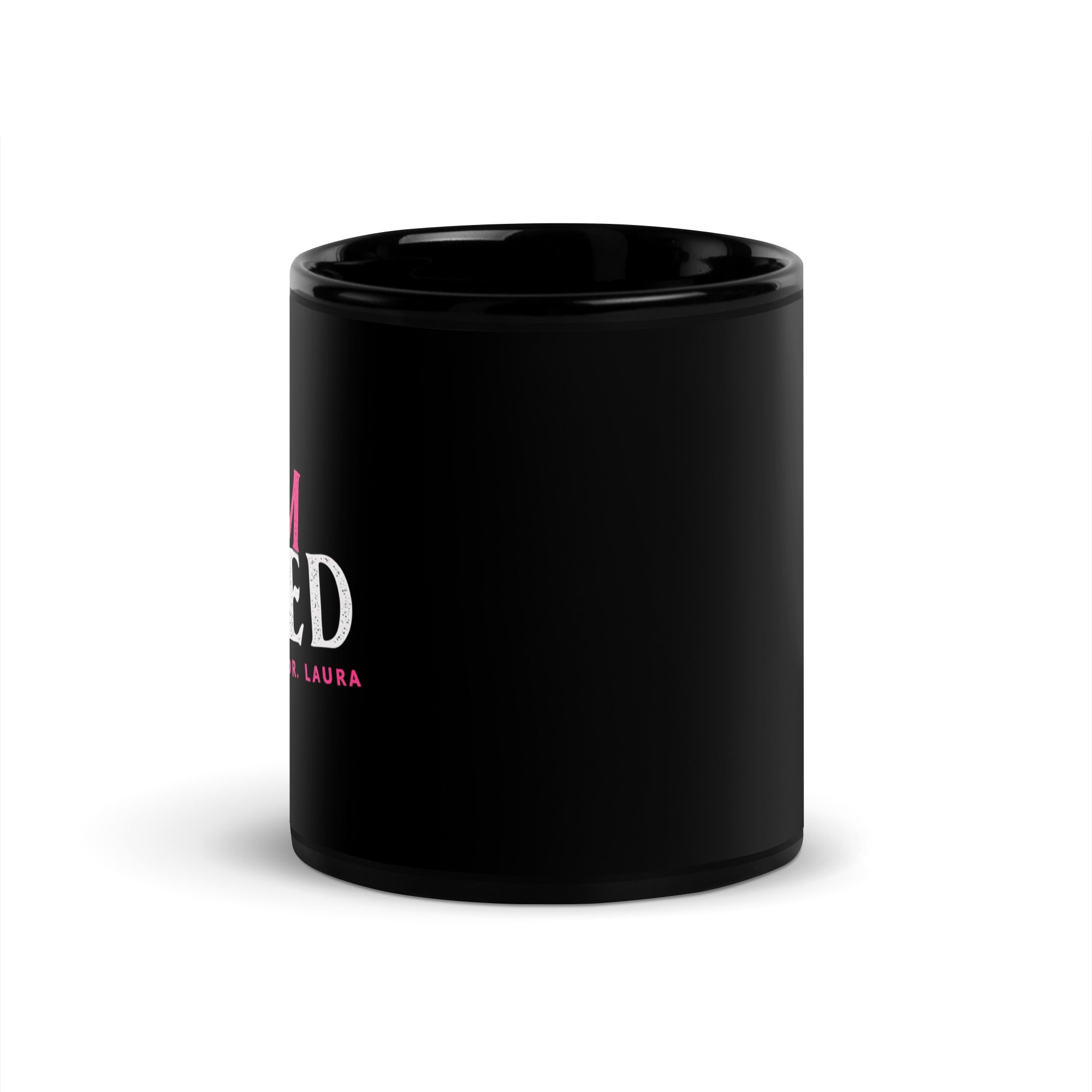 Black glossy mug with partially visible pink and white frontside text.