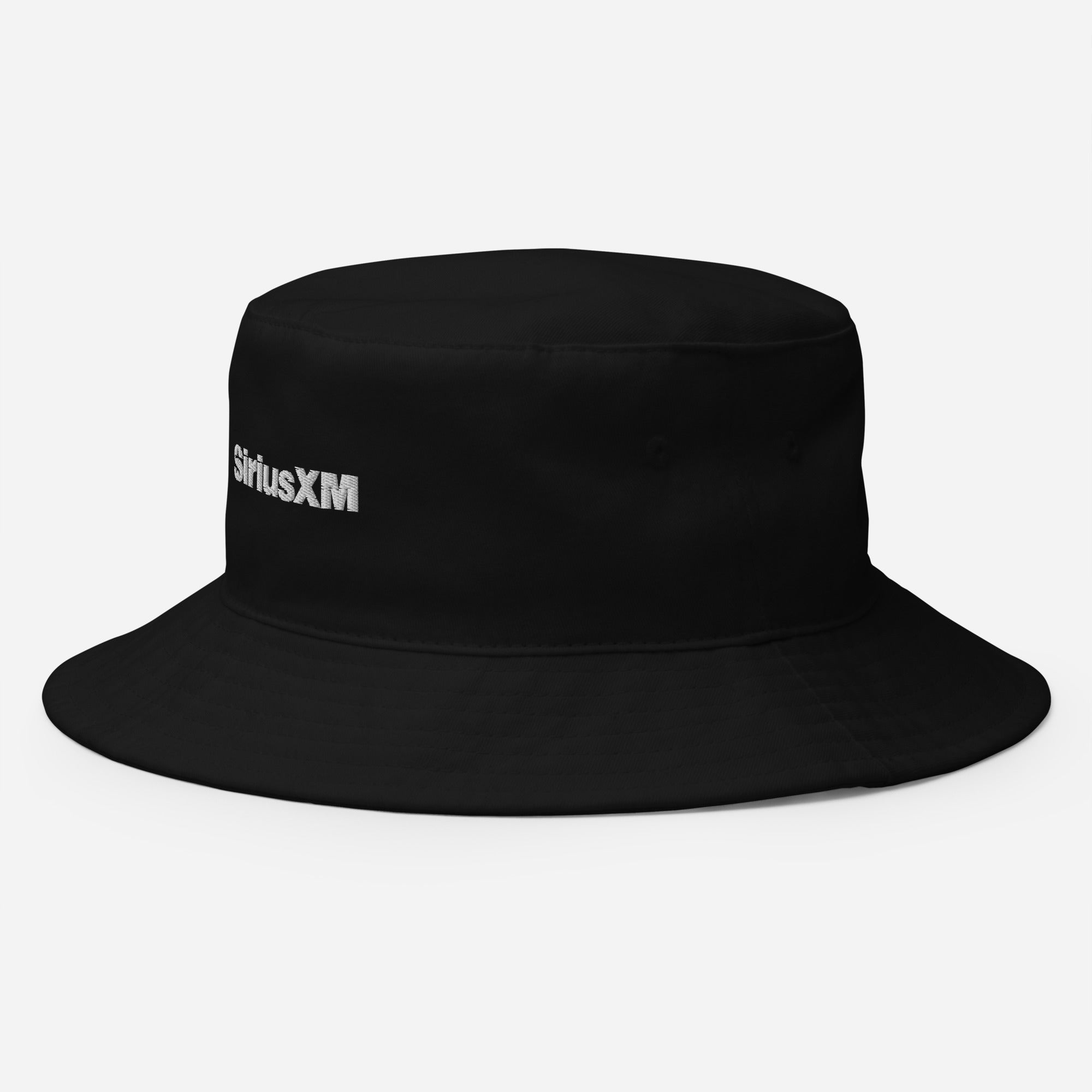 Side view of black bucket hat featuring the embroidered logo 'SiriusXM' in white on the left side.