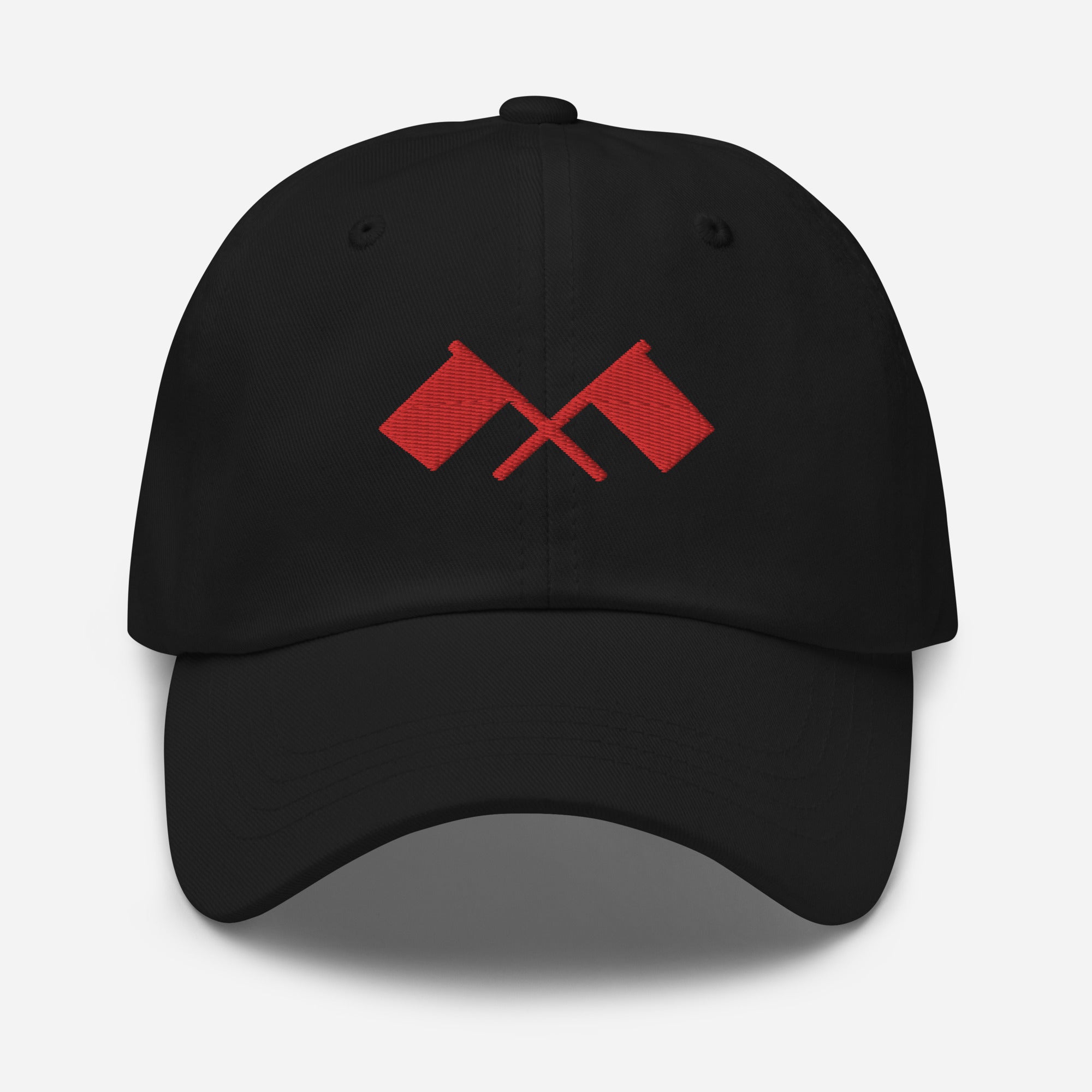 Black cap with crossed red flags on the front.