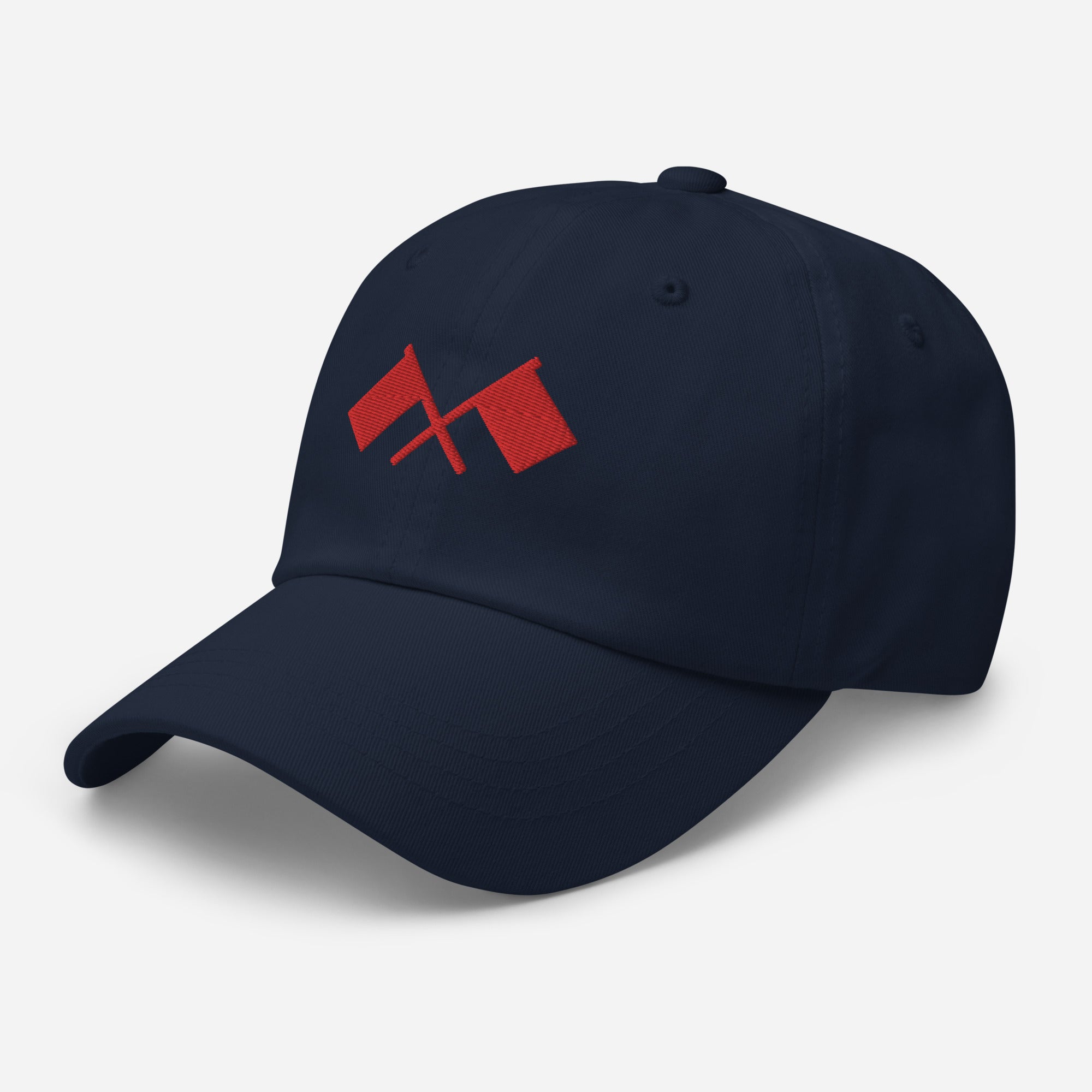 Front side view of navy blue baseball cap with red crossed flags design.