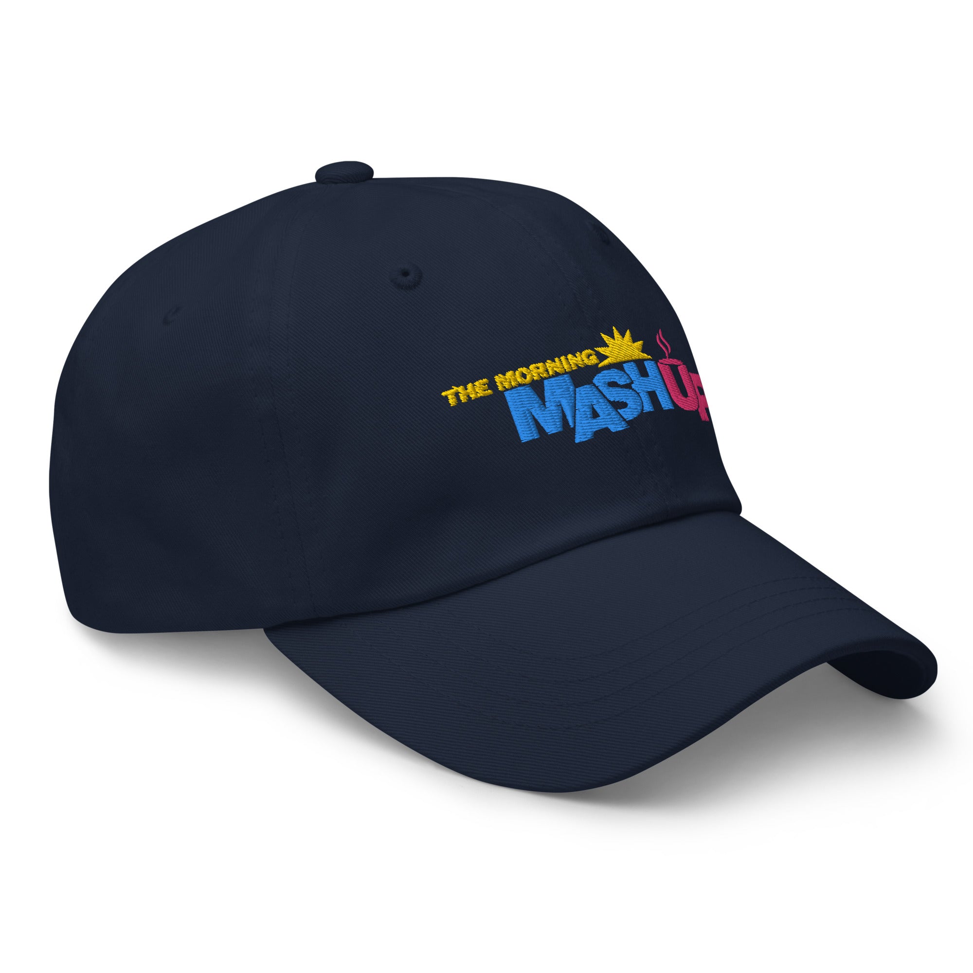 A navy blue baseball cap featuring the embroidered text 'THE MORNING MASHUP' with a sun and steaming coffee graphic.