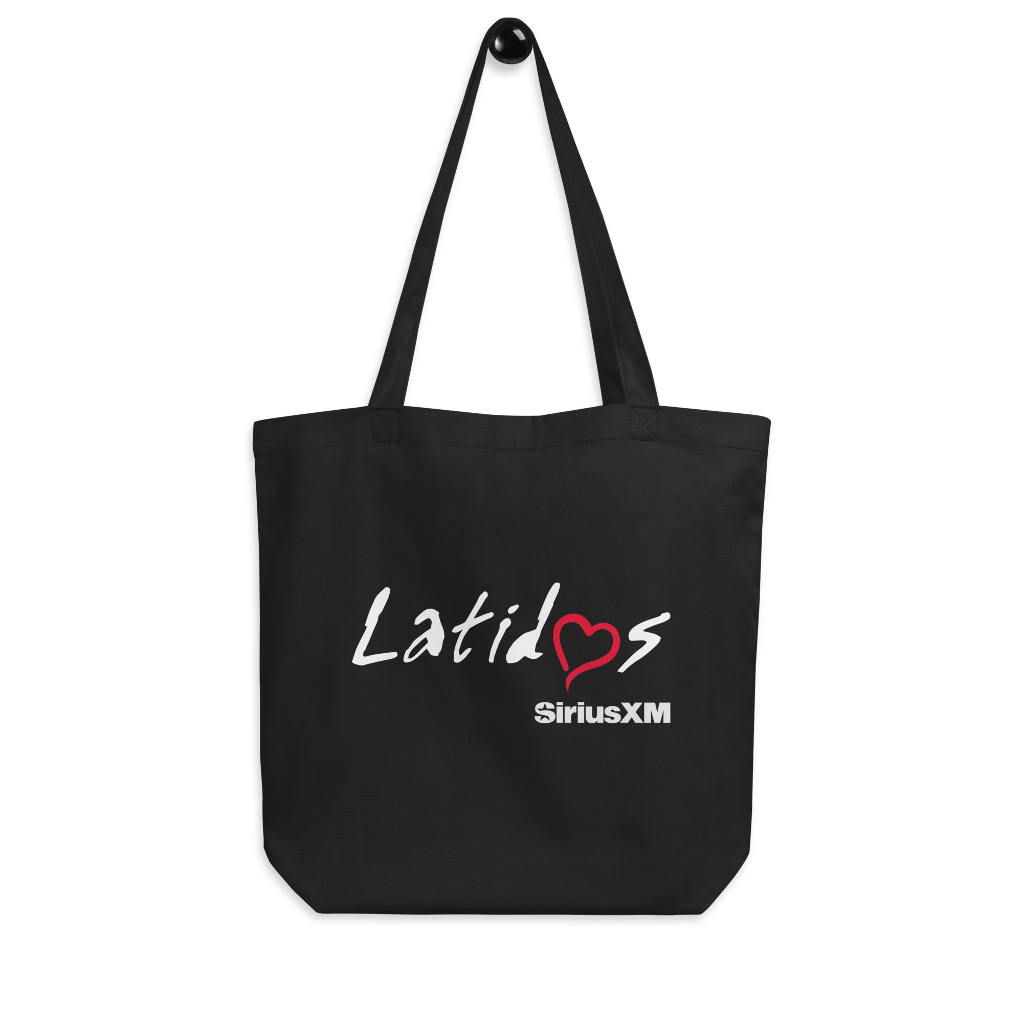 Black tote bag featuring 'Latidos' with a red heart and 'SiriusXM' logo.