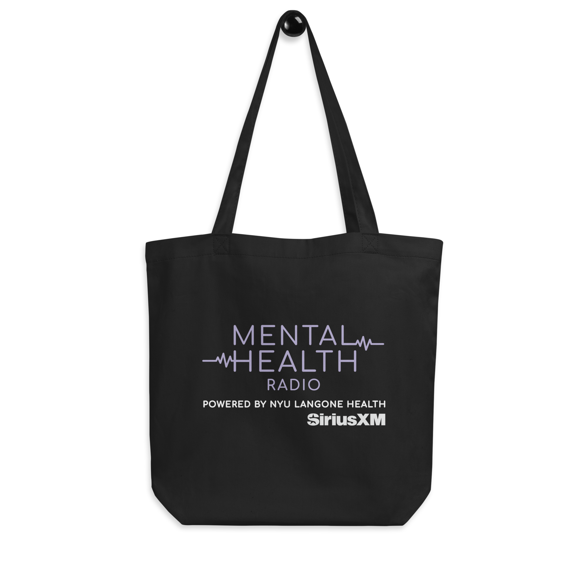 Black tote bag featuring 'MENTAL HEALTH RADIO' in purple powered by NYU Langone Health in grey and SiriusXM logo in white.