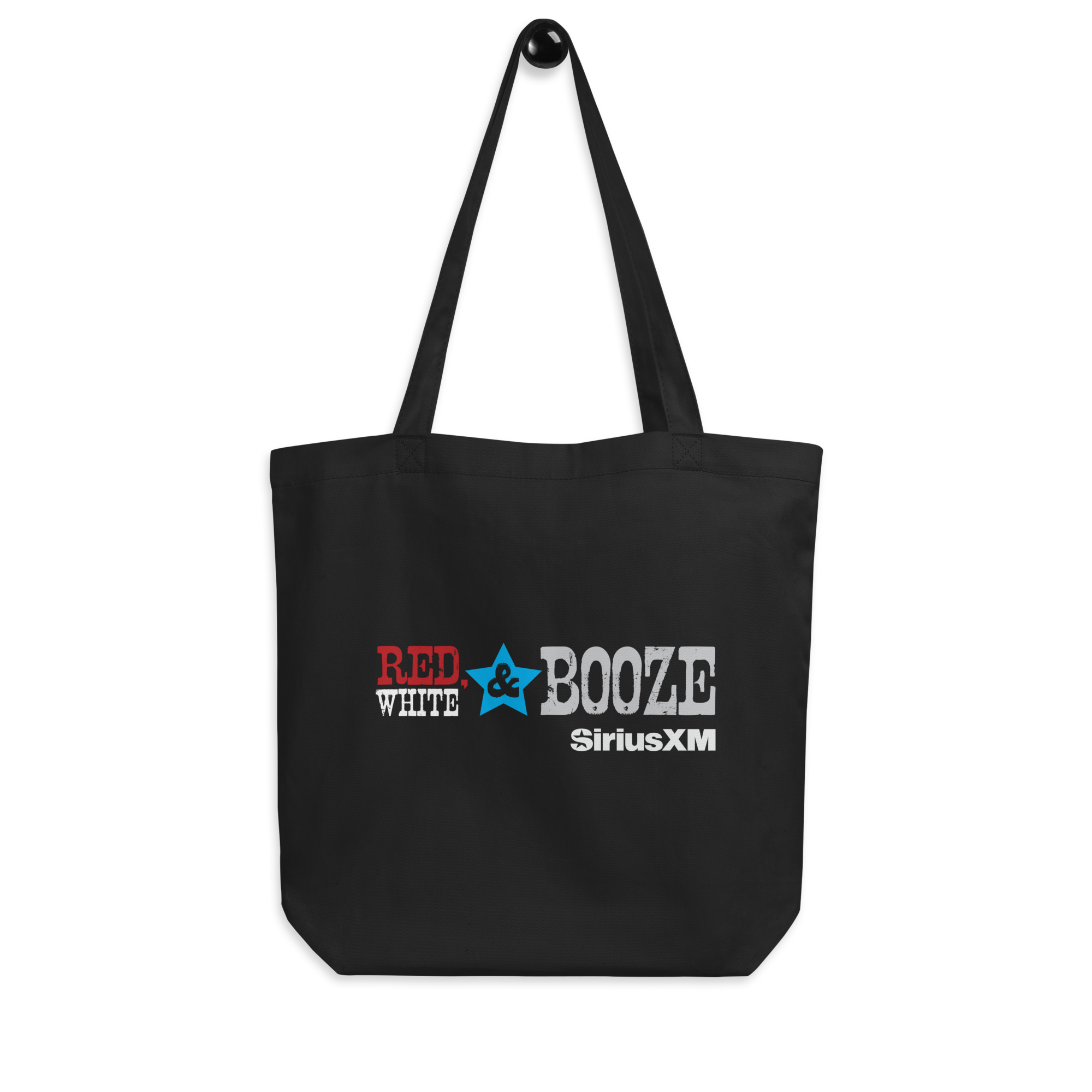 Black tote bag featuring the text 'RED, WHITE & BOOZE SiriusXM' in bold, colorful typography, on black background.