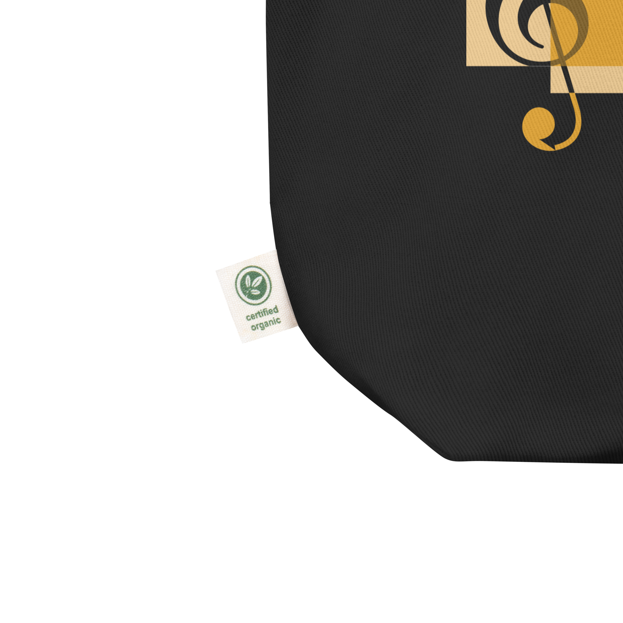 Close up of black tote corner pouch featuring a tag stating 'certified organic.'