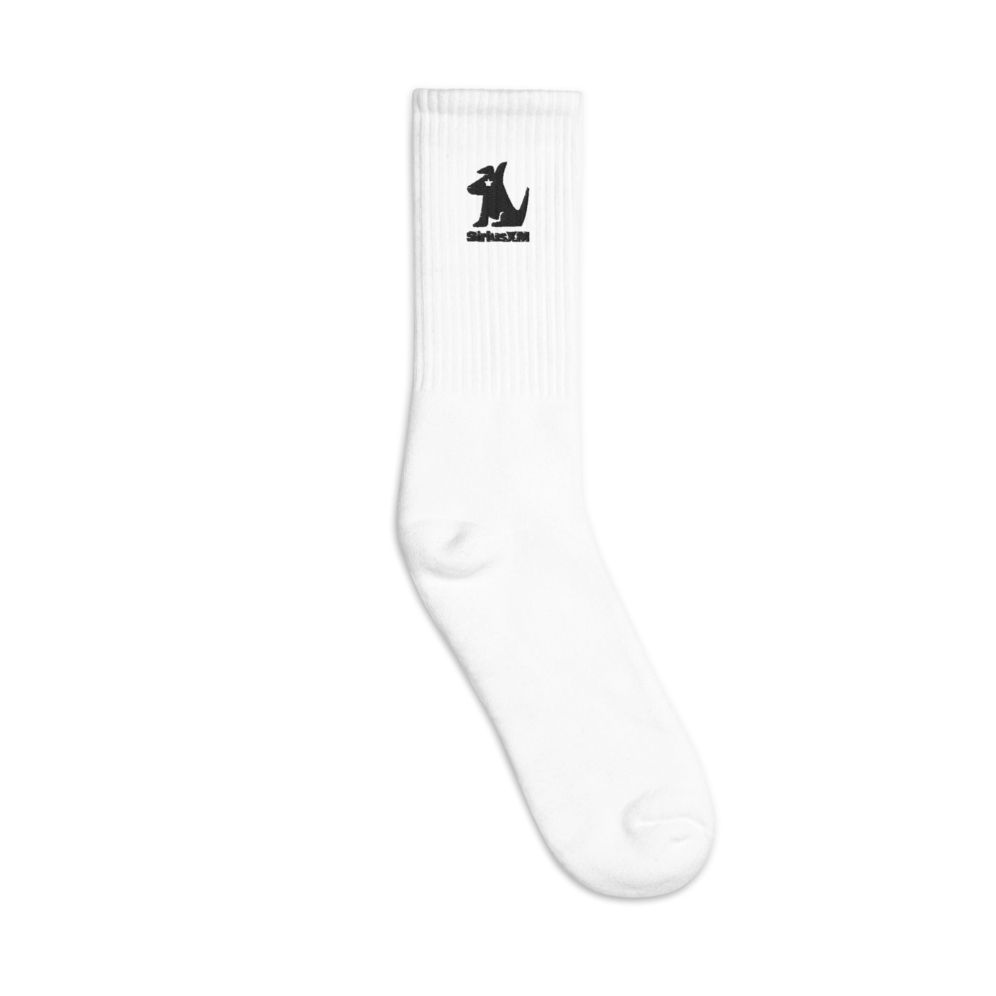 A white athledic sock with ribbed cuffs featuring a black embroidered Stella dog mascot and 'SiriusXM' logo.