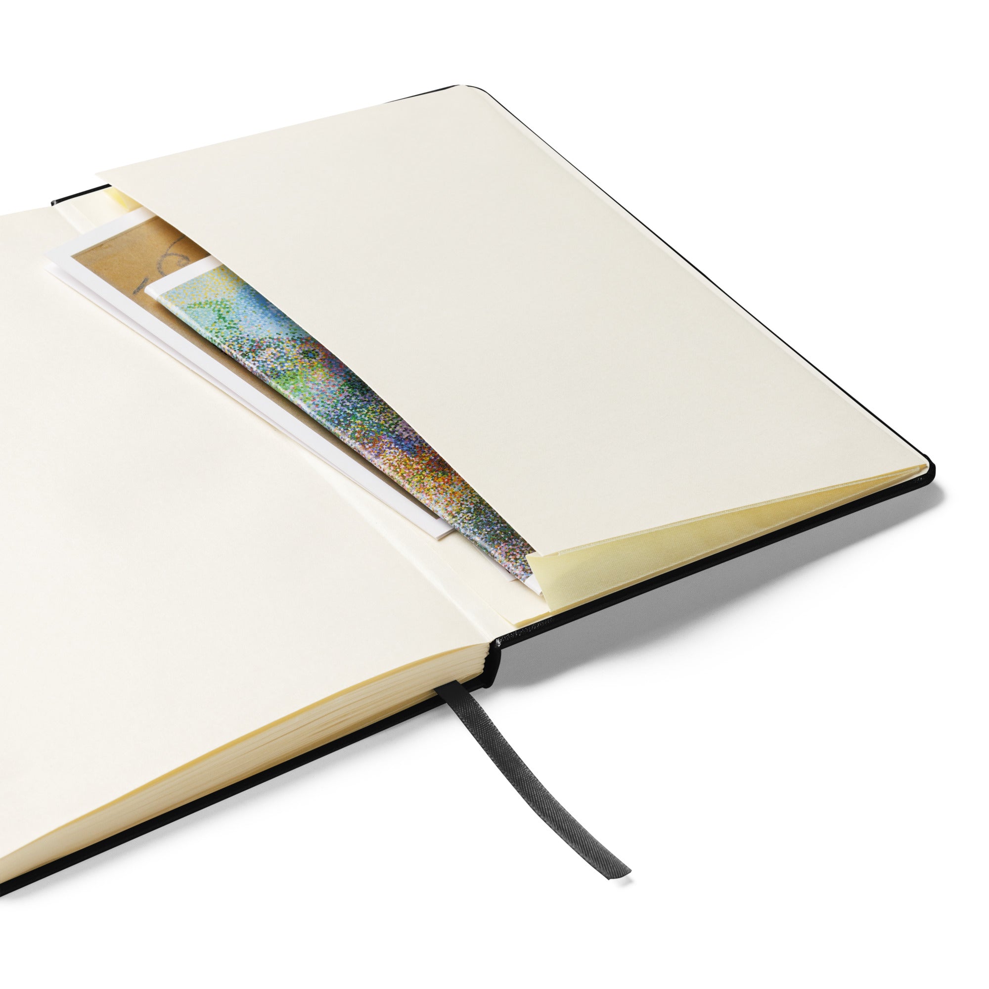 A detailed shot of the inside back cover of the notebook, showing a built-in pocket holding colorful papers and notes, ideal for storing small documents or mementos.