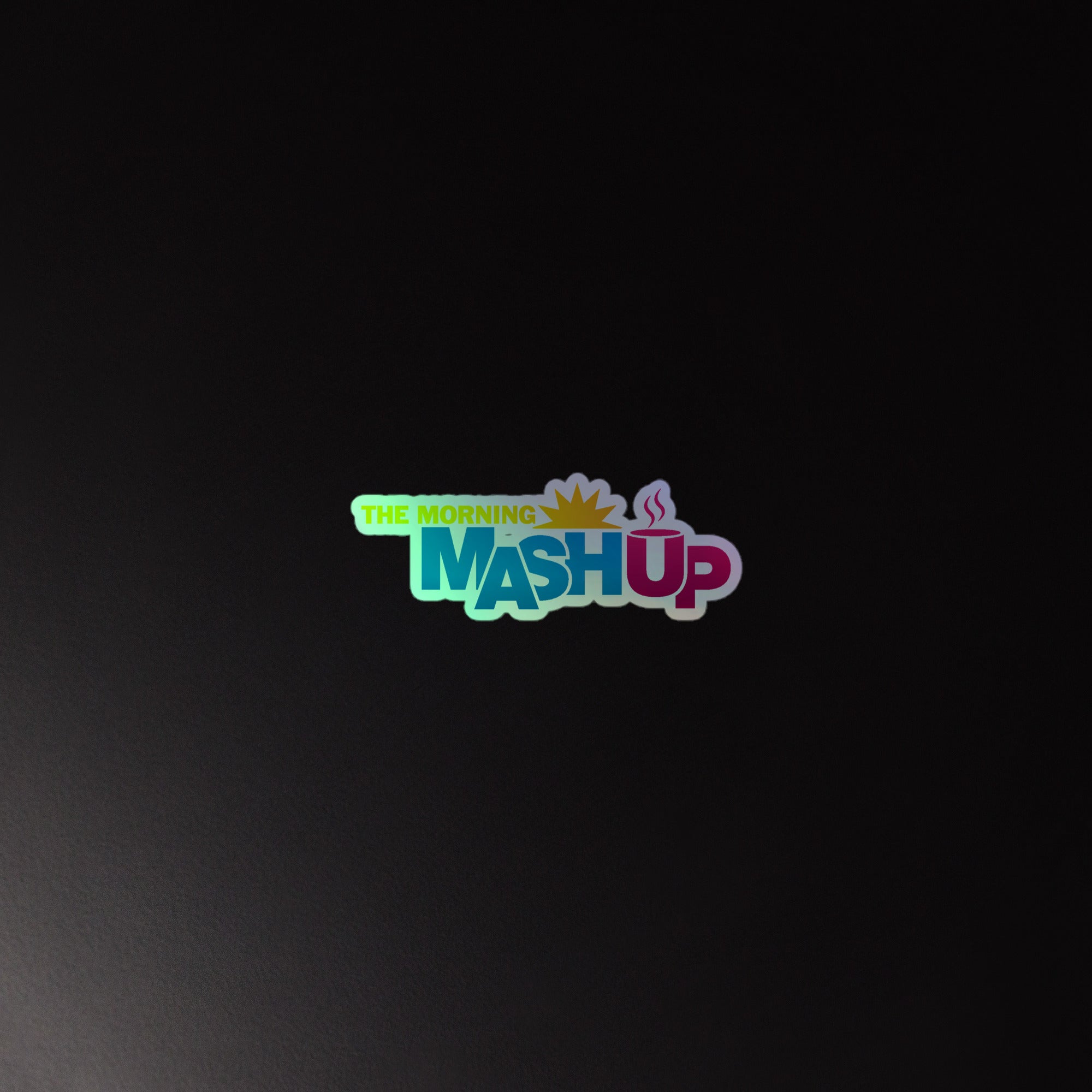 Holographic sticker featuring 'The Morning Mashup' logo on a dark background.