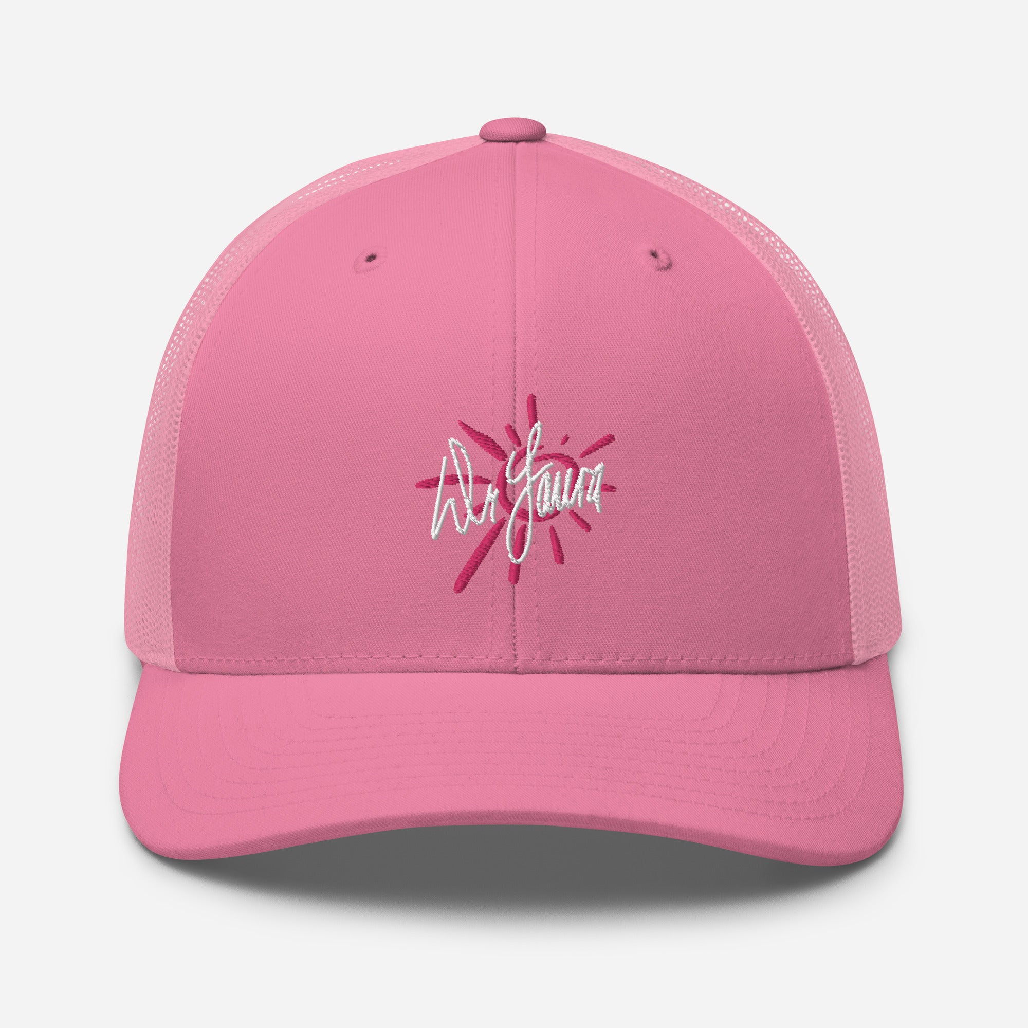 Low angle of pink trucker style baseball cap with a white embroidered design featuring the 'Dr. Laura' signature logo and a doodle of the sun in hot pink.