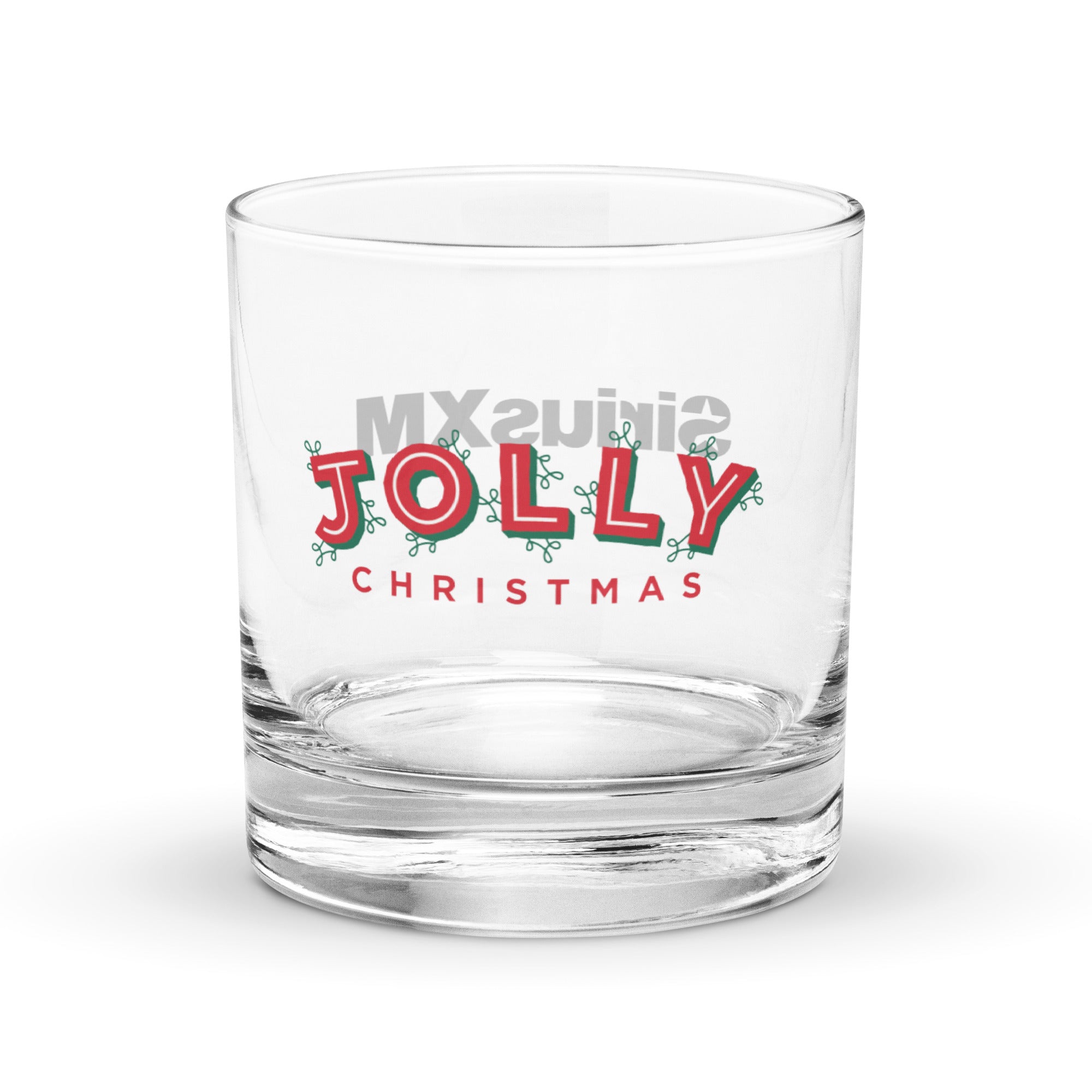 One side of clear rocks glass with the Jolly Christmas logo in festive, red text in the center.