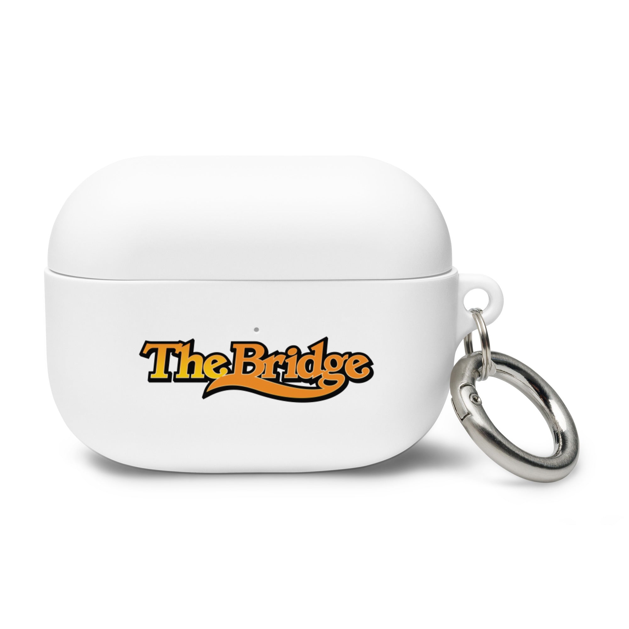 White AirPods Pro case with a keychain, featuring the logo 'The Bridge.' in an orange gradient with a black outline.