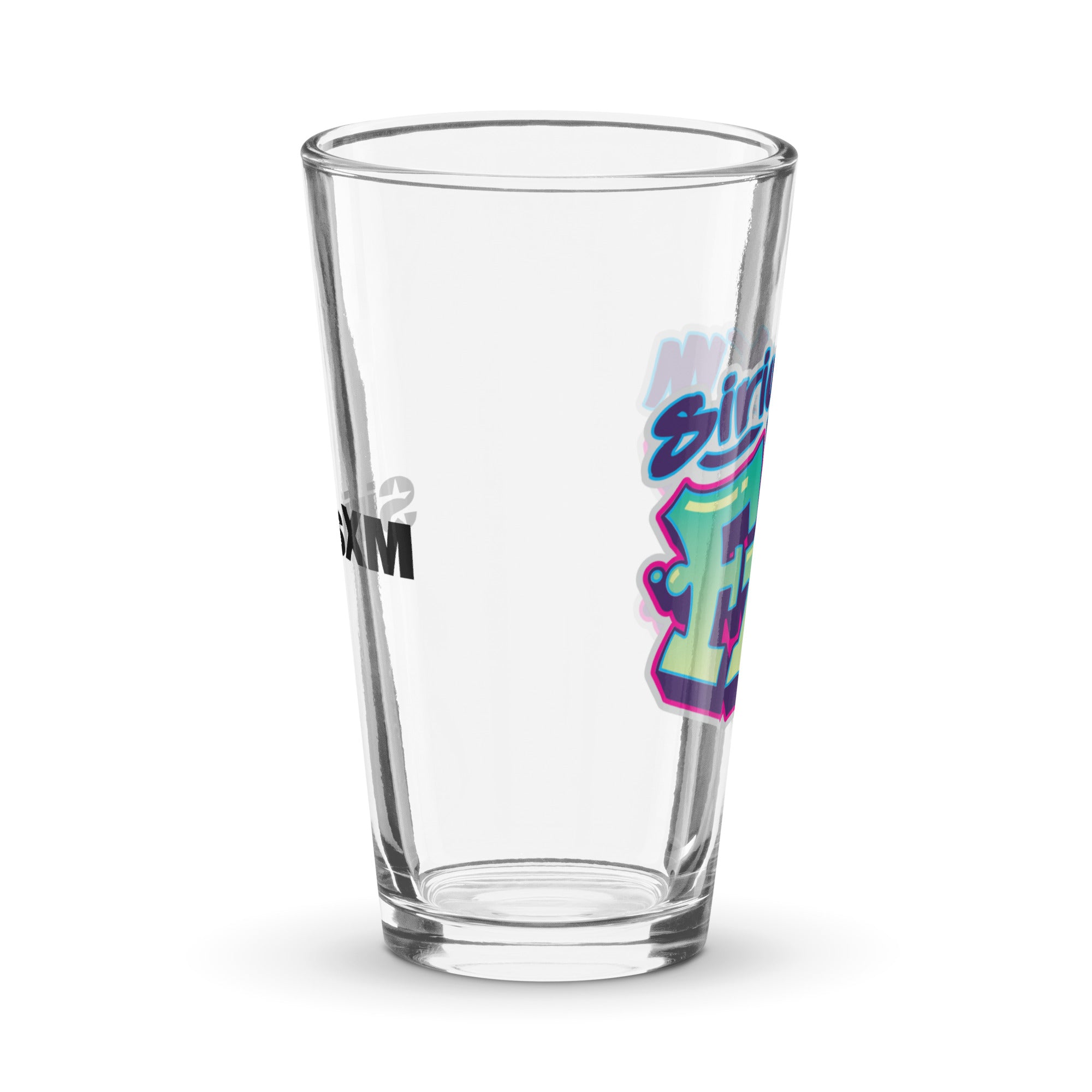 Side view of clear pint glass featuring partially visible front and back designs.