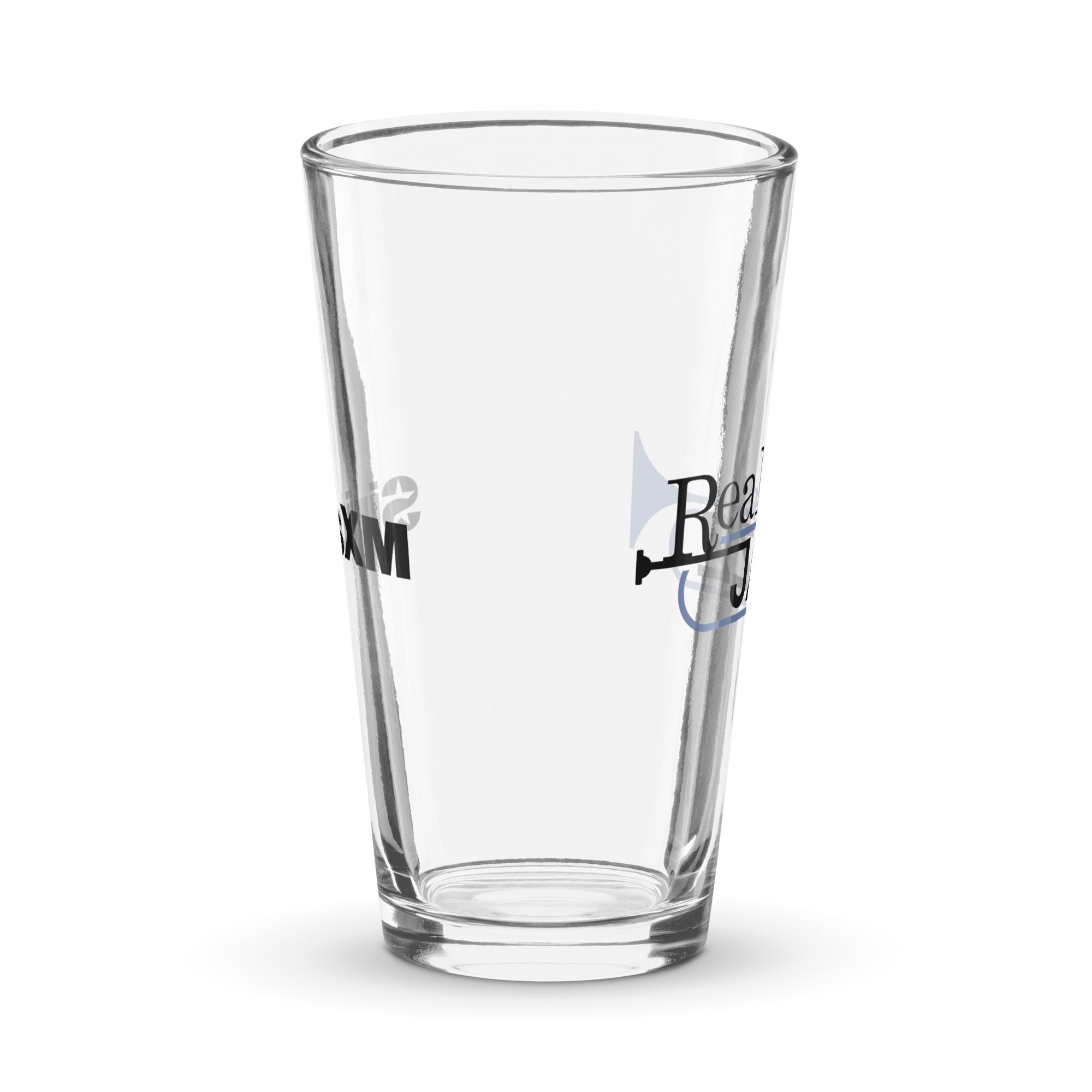 Side view of clear pint glass featuring partially visible front and back designs.