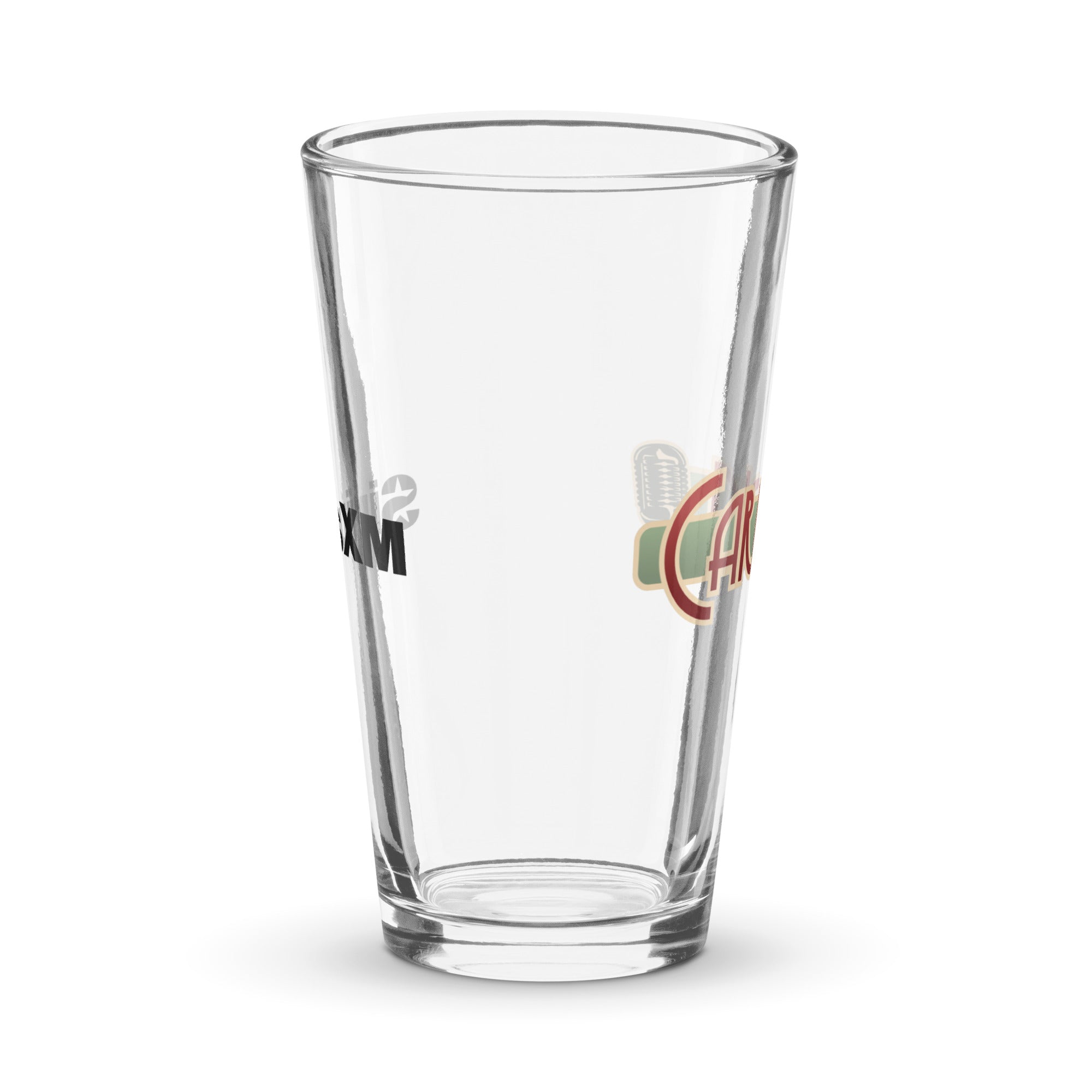 Side view of clear pint glass featuring partially visible front and back designs.