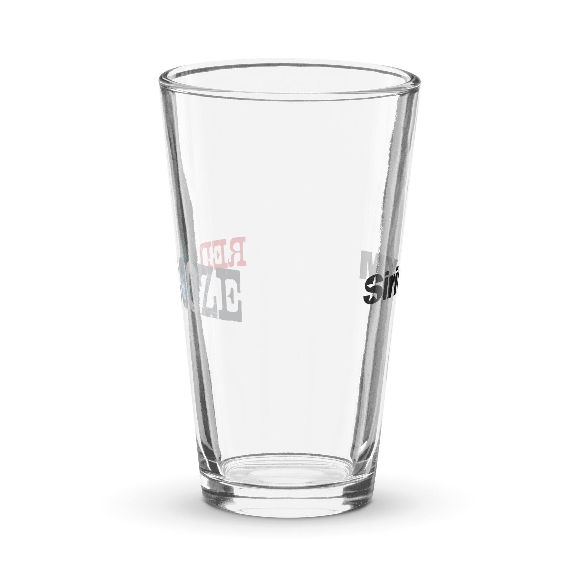 Side view of clear pint glass featuring partially visible front and back designs.