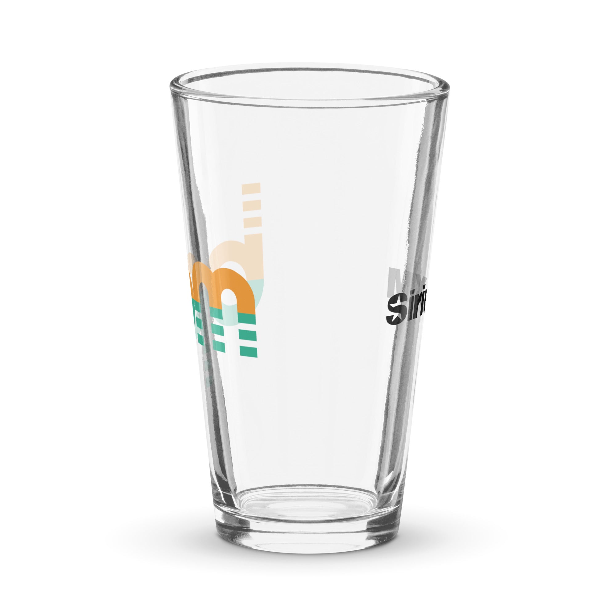 Side view of clear pint glass featuring partially visible front and back designs.