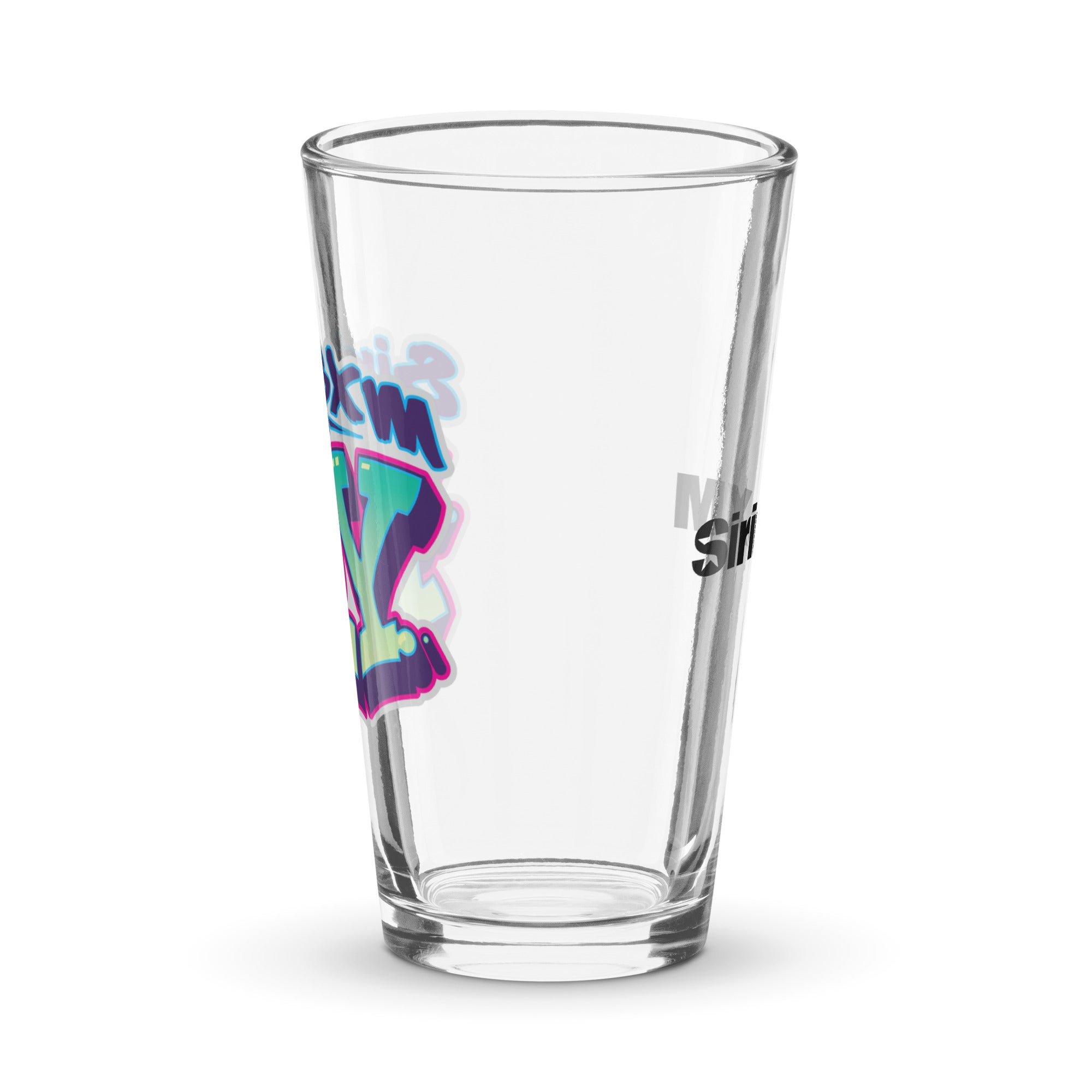 Side view of clear pint glass featuring partially visible front and back designs.