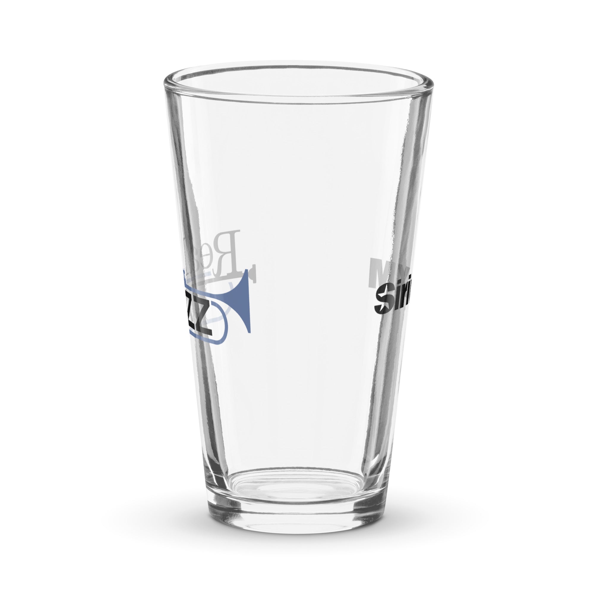 Side view of clear pint glass featuring partially visible front and back designs.