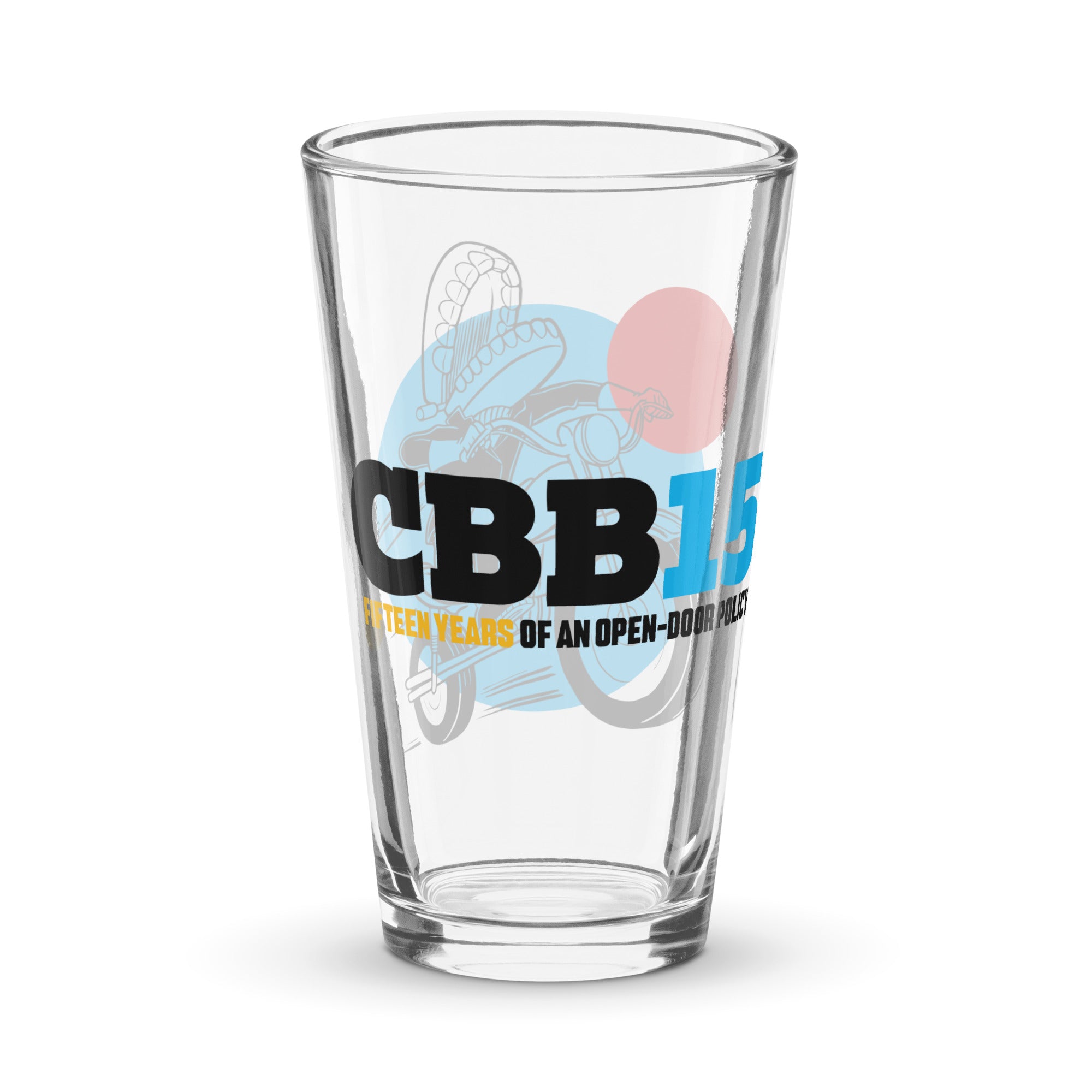 Back side of pint glass featuring black text 'CBB 15' and 'Fifteen Years of an Open-Door Policy.'