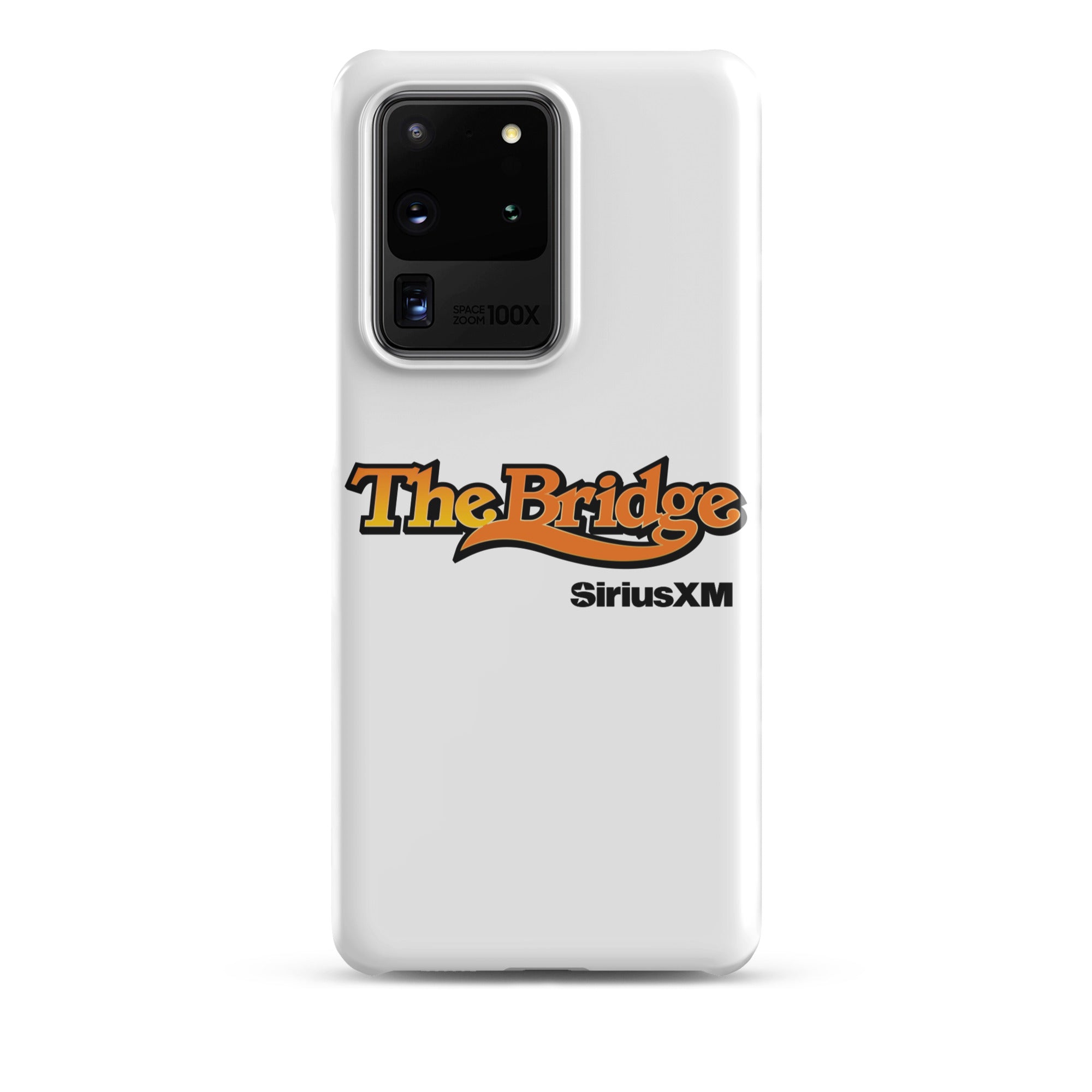 A white phone case featuring the logo 'The Bridge' in an orange gradient and black outline, and  'SiriusXM' in black.