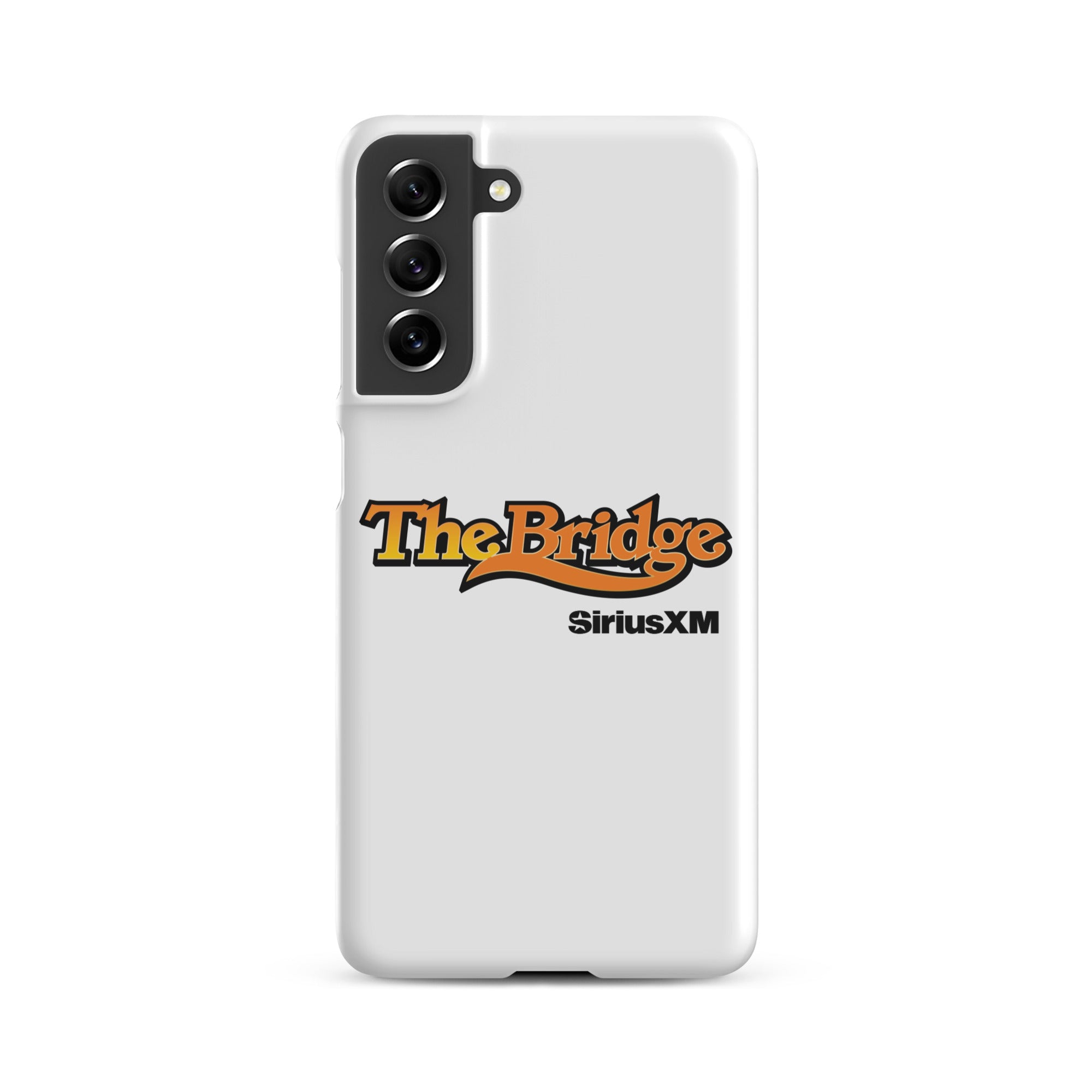 A white phone case featuring the logo 'The Bridge' in an orange gradient and black outline, and  'SiriusXM' in black.