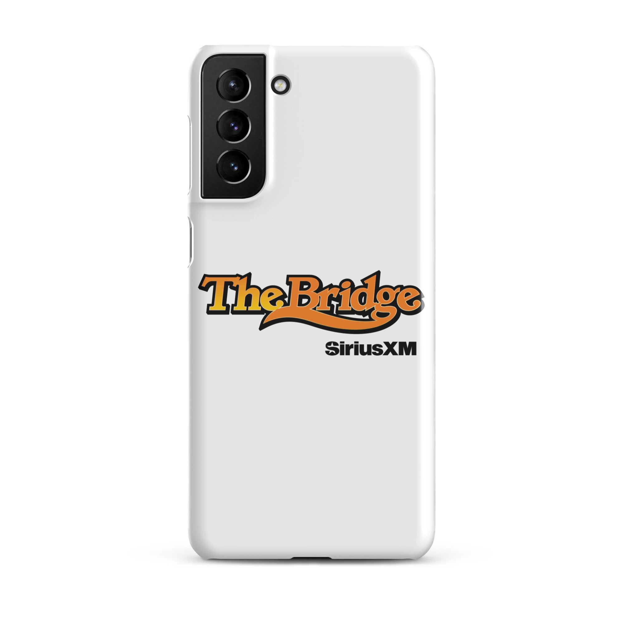 A white phone case featuring the logo 'The Bridge' in an orange gradient and black outline, and  'SiriusXM' in black.