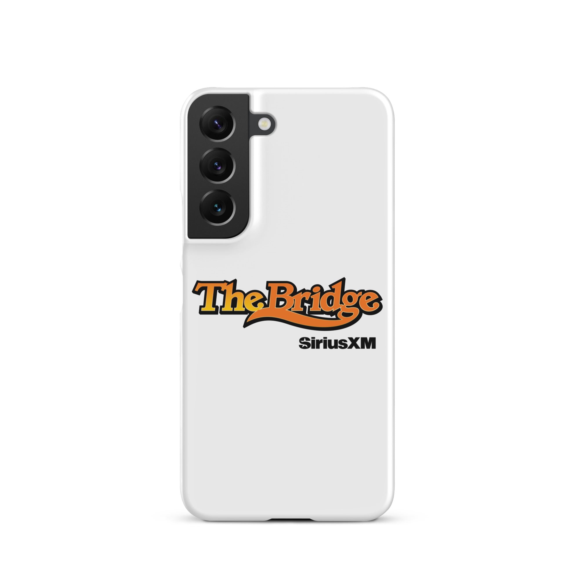 A white phone case featuring the logo 'The Bridge' in an orange gradient and black outline, and  'SiriusXM' in black.