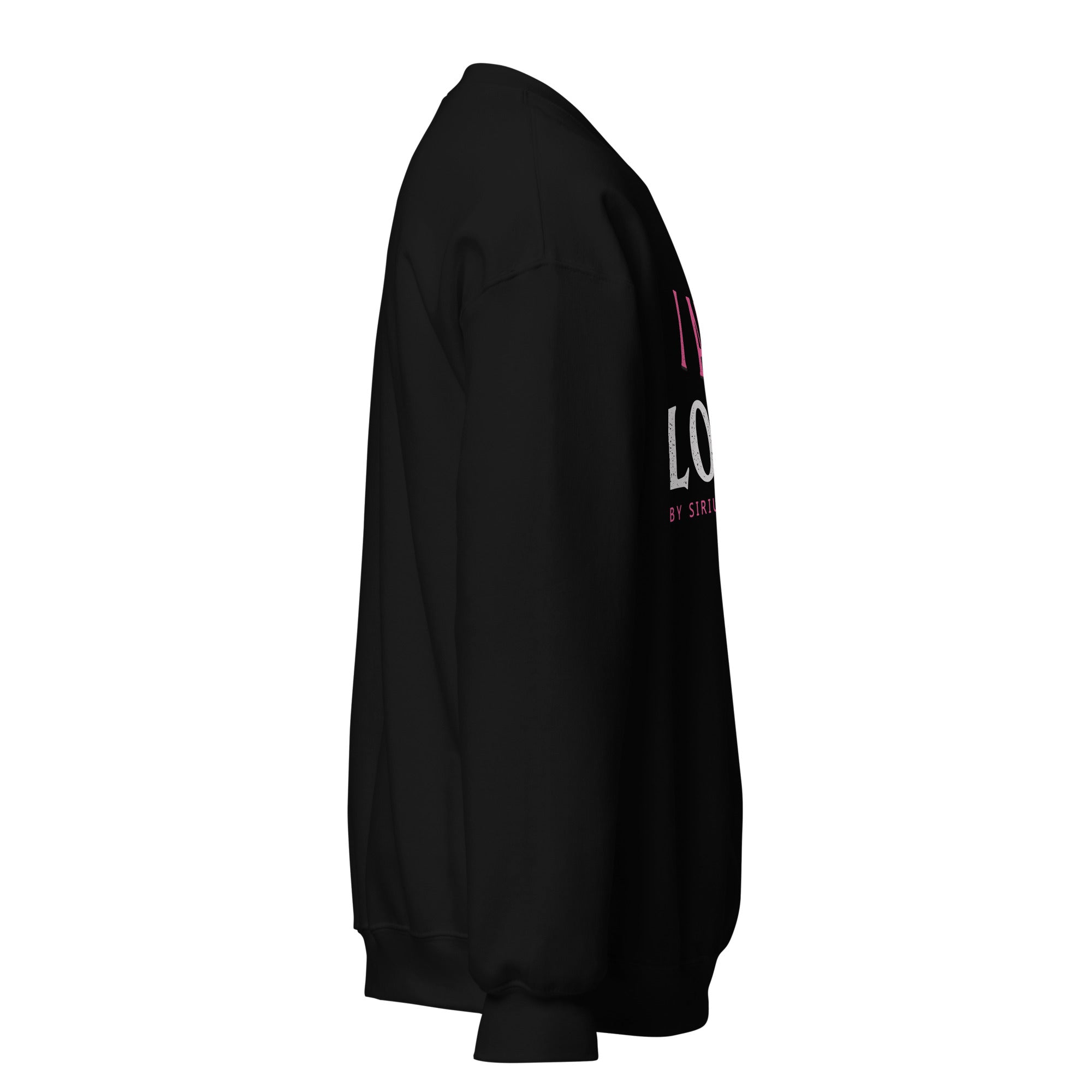 Right side view of black crewneck sweatshirt featuring partially visible pink and white lettering of frontside graphic against a white background. 