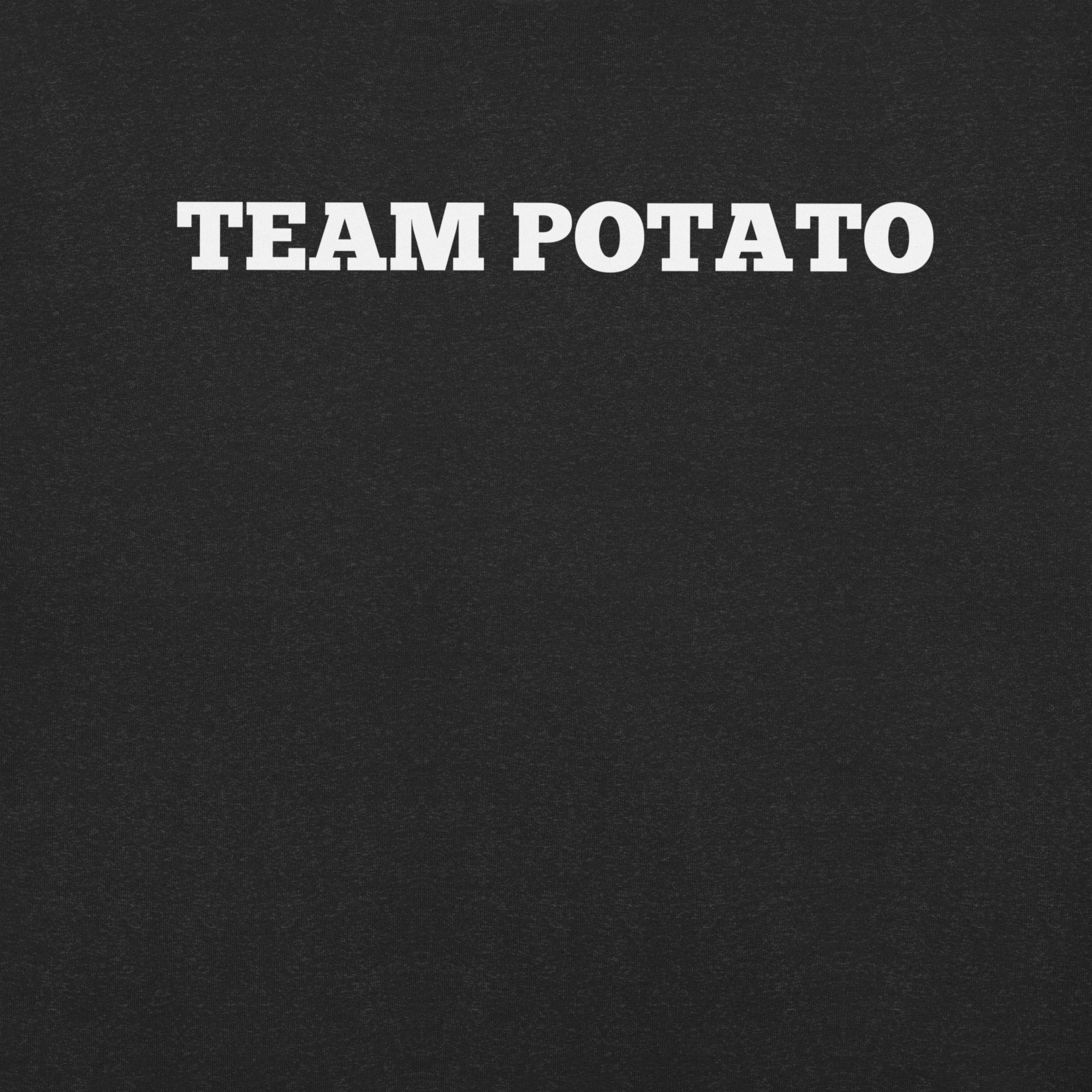  A close-up of the 'TEAM POTATO' text design on the black heather t-shirt, highlighting the bold, white uppercase lettering against the dark fabric.