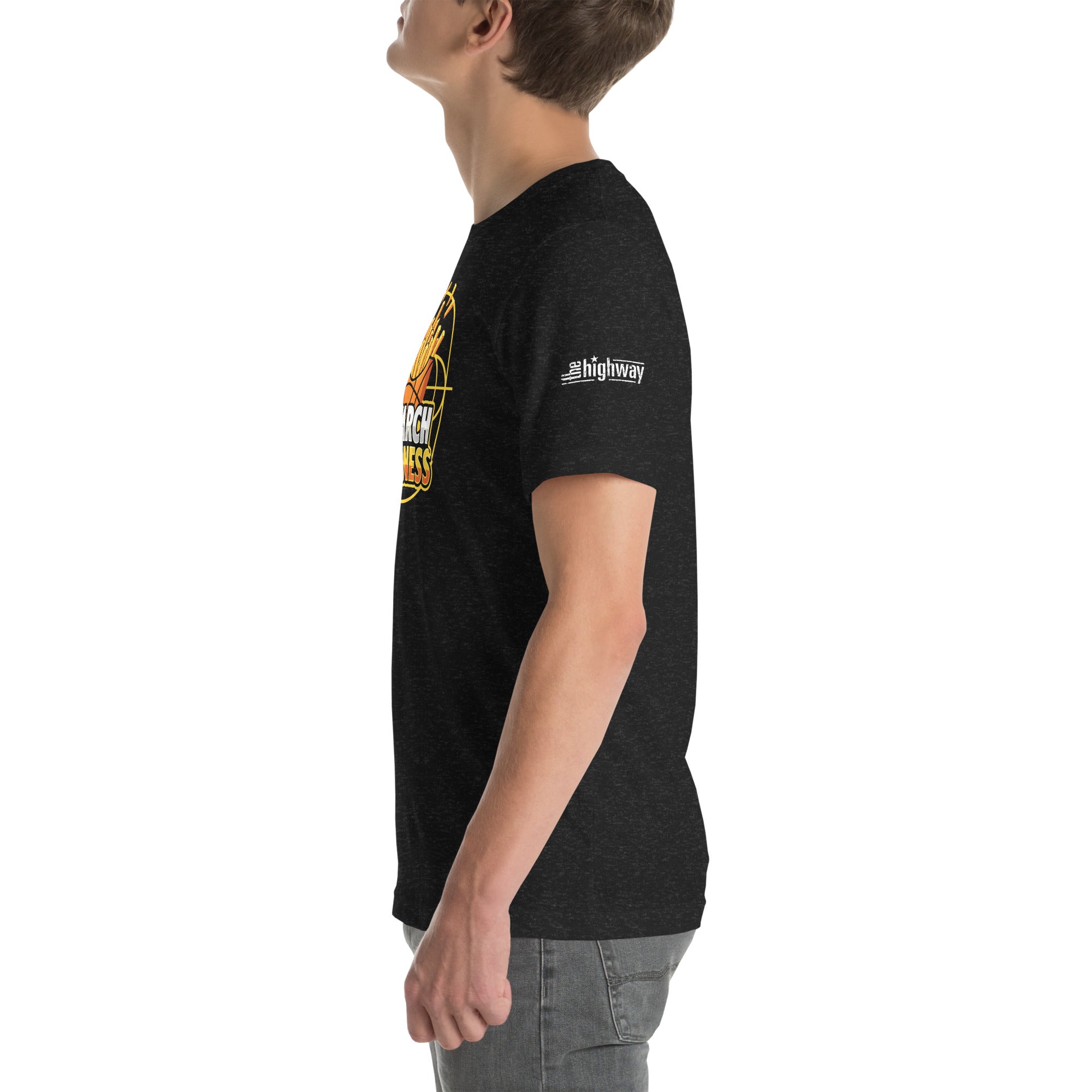 A side view of a model wearing the 'Starch Madness' t-shirt. The design is visible from an angle, and the left sleeve features a small logo that reads 'The Highway.'