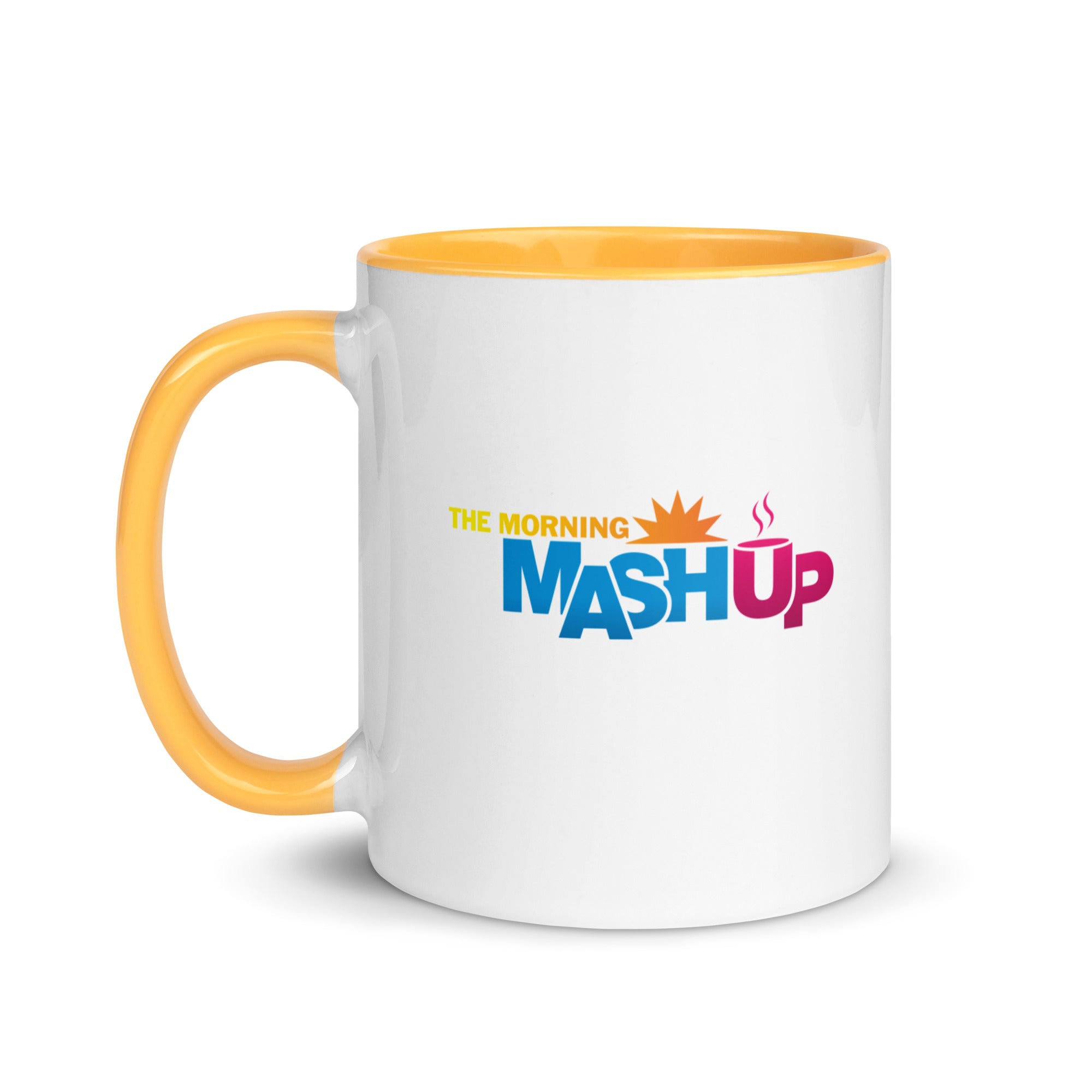 A white mug with a yellow interior and handle, featuring a multi-colored 'THE MORNING MASH UP' logo in yellow, orange, blue, and pink.