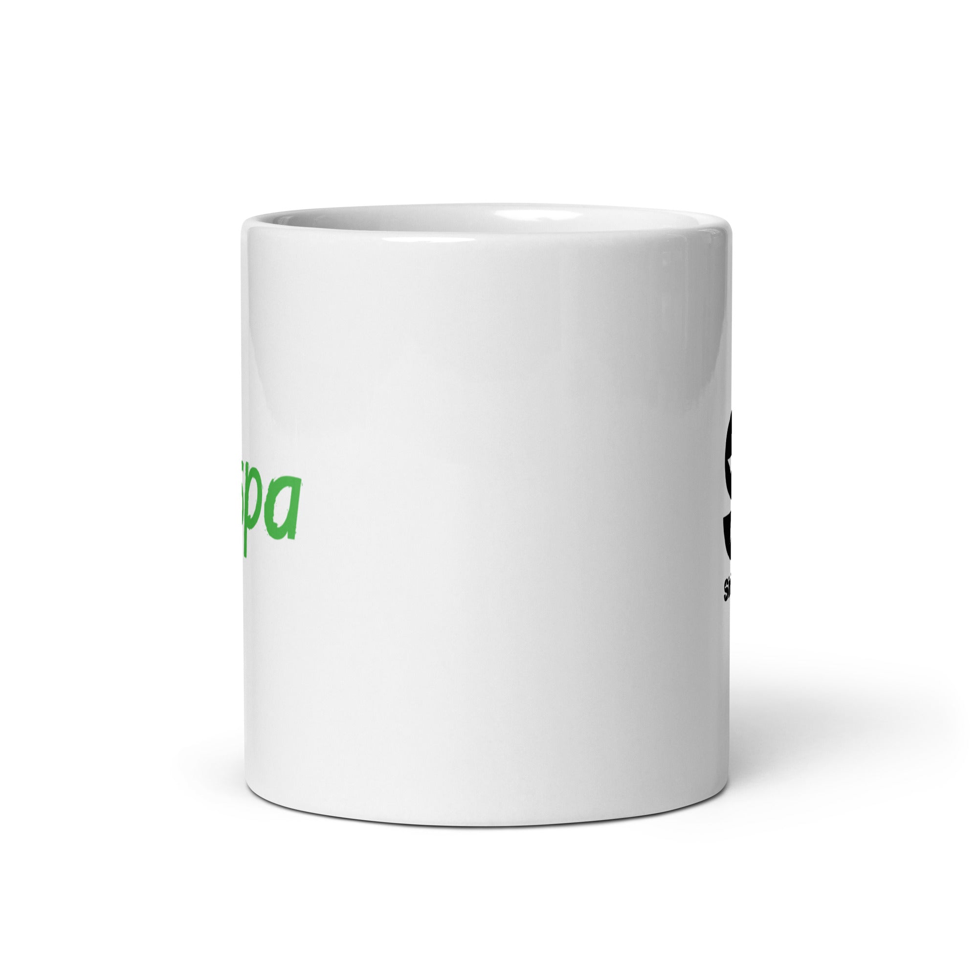 White ceramic mug. View opposite of handle.