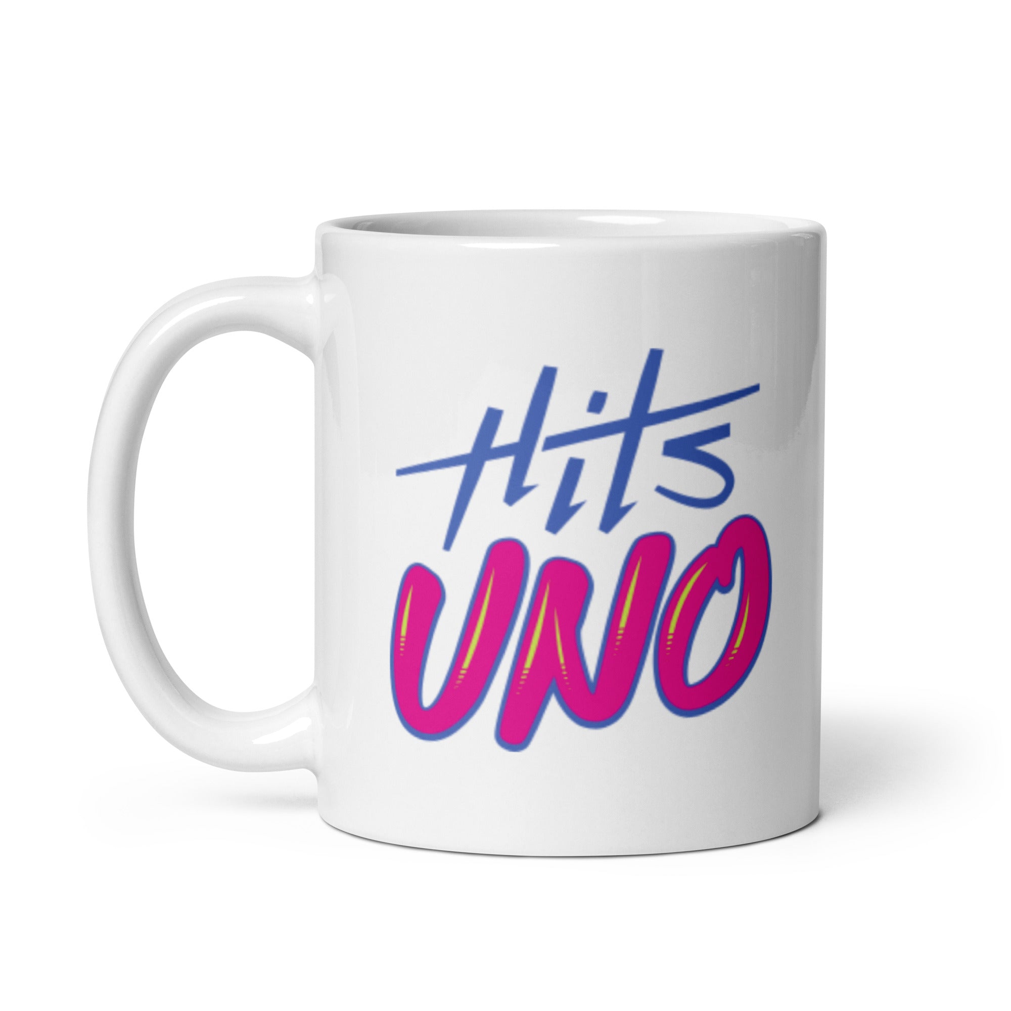 White mug with colorful text 'Hits UNO' in blue and pink.