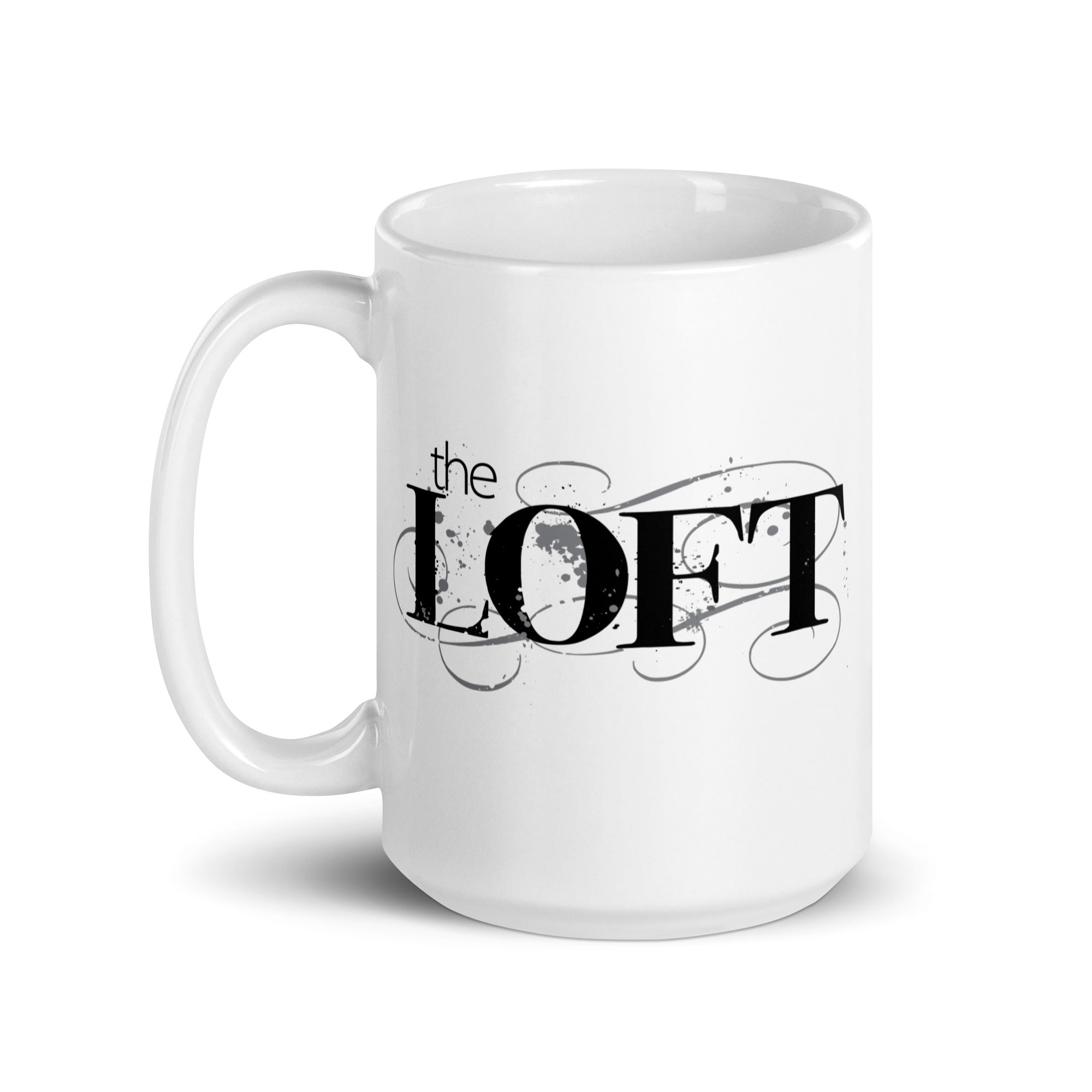 White coffee mug featuring the text 'the LOFT' in a stylish font with decorative swirls.