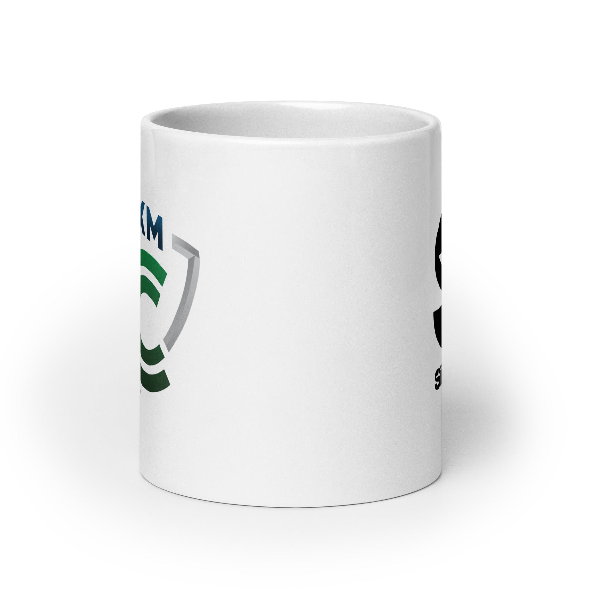 White mug. View opposite of handle.