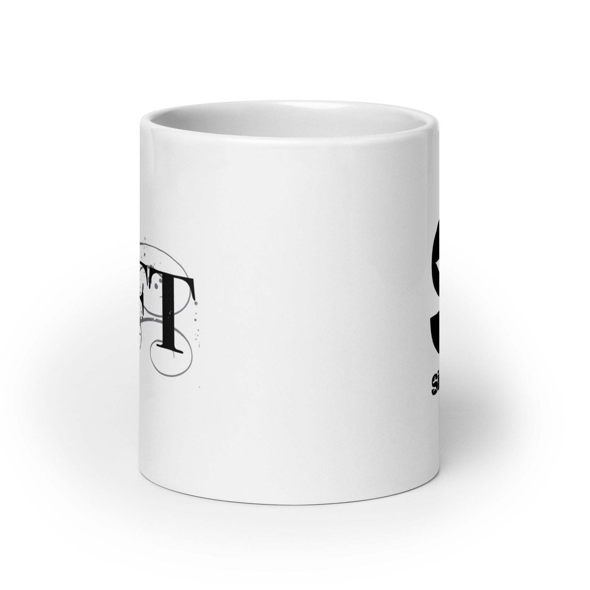 White ceramic mug. View opposite of handle.