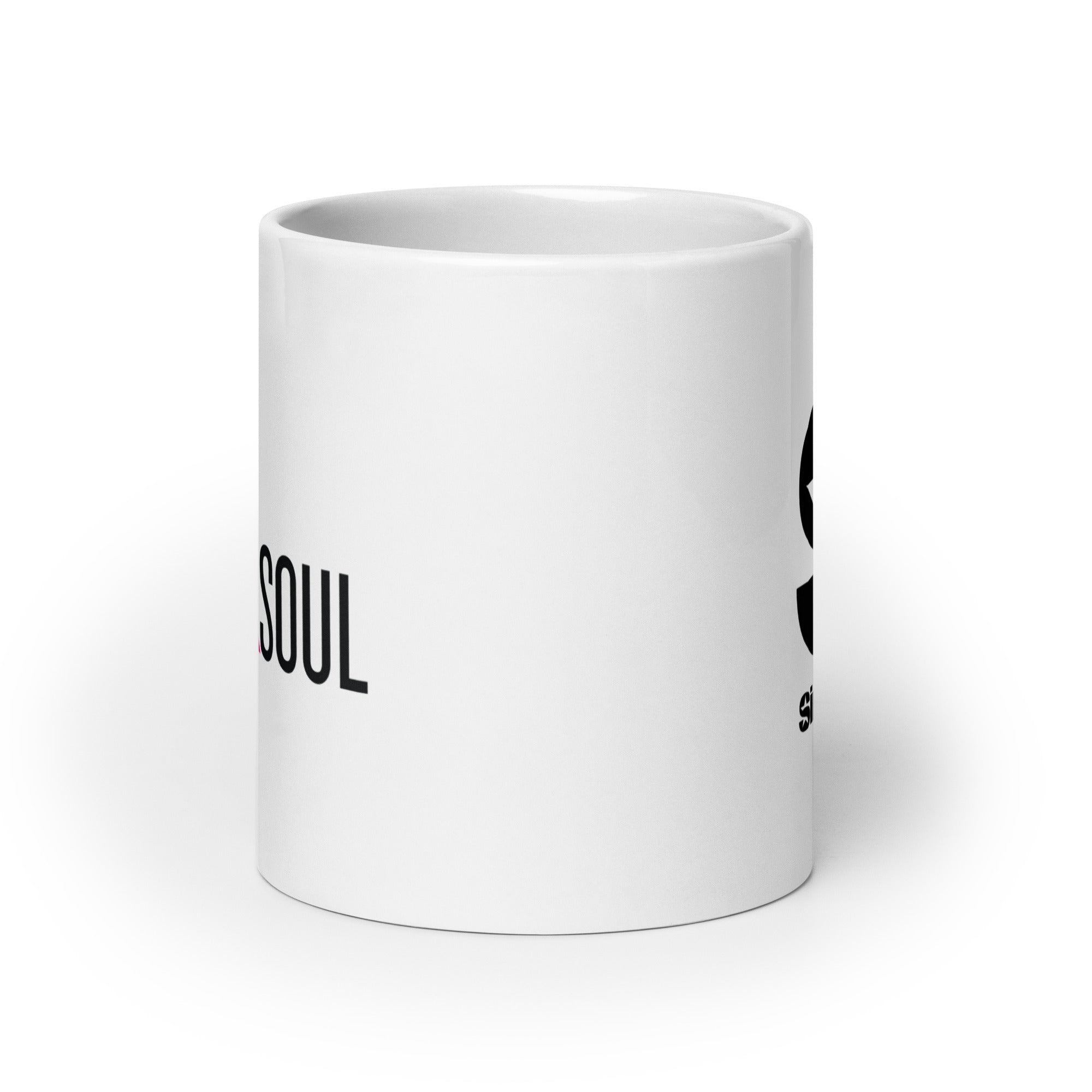 White ceramic mug. View opposite of handle.