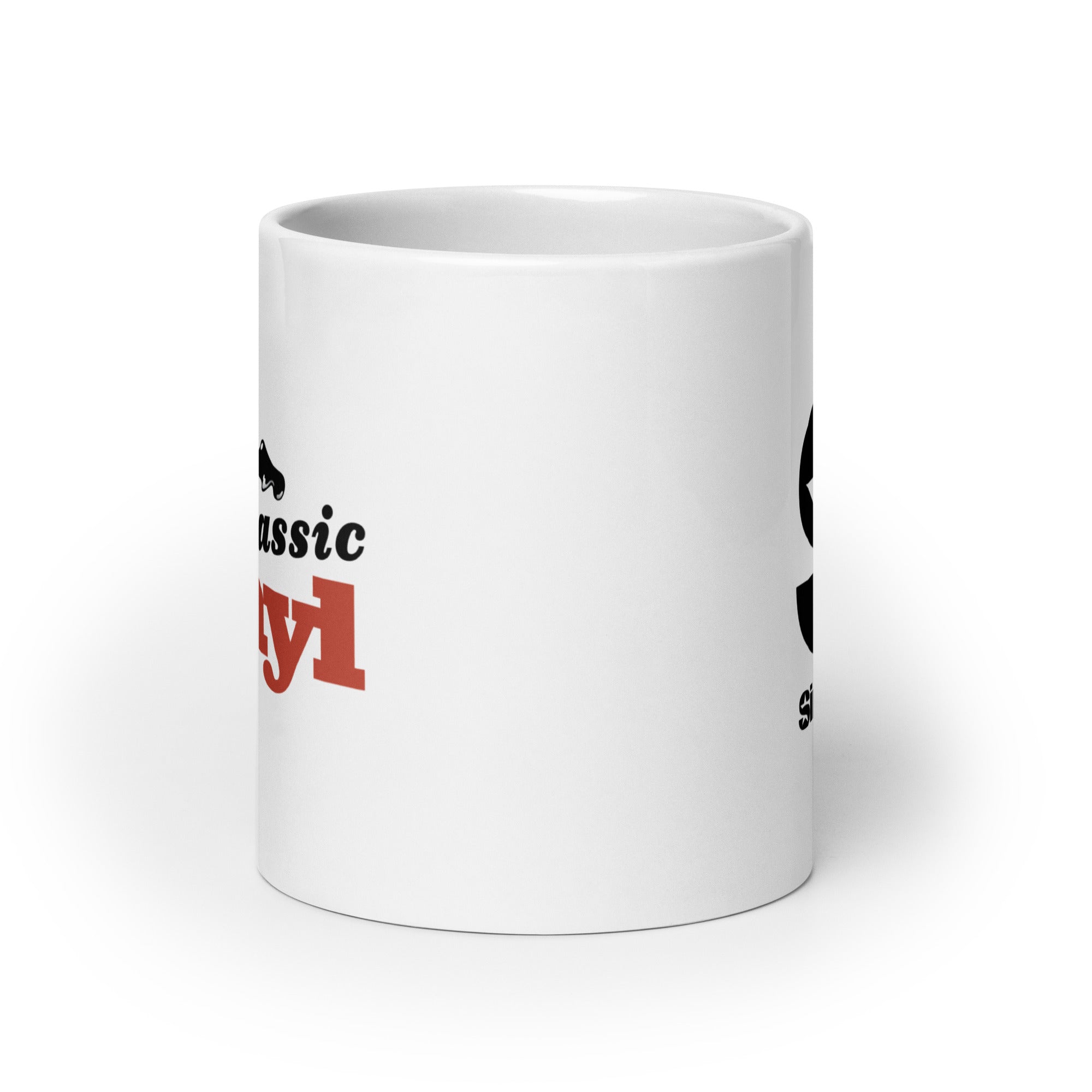 White mug. View opposite of handle.