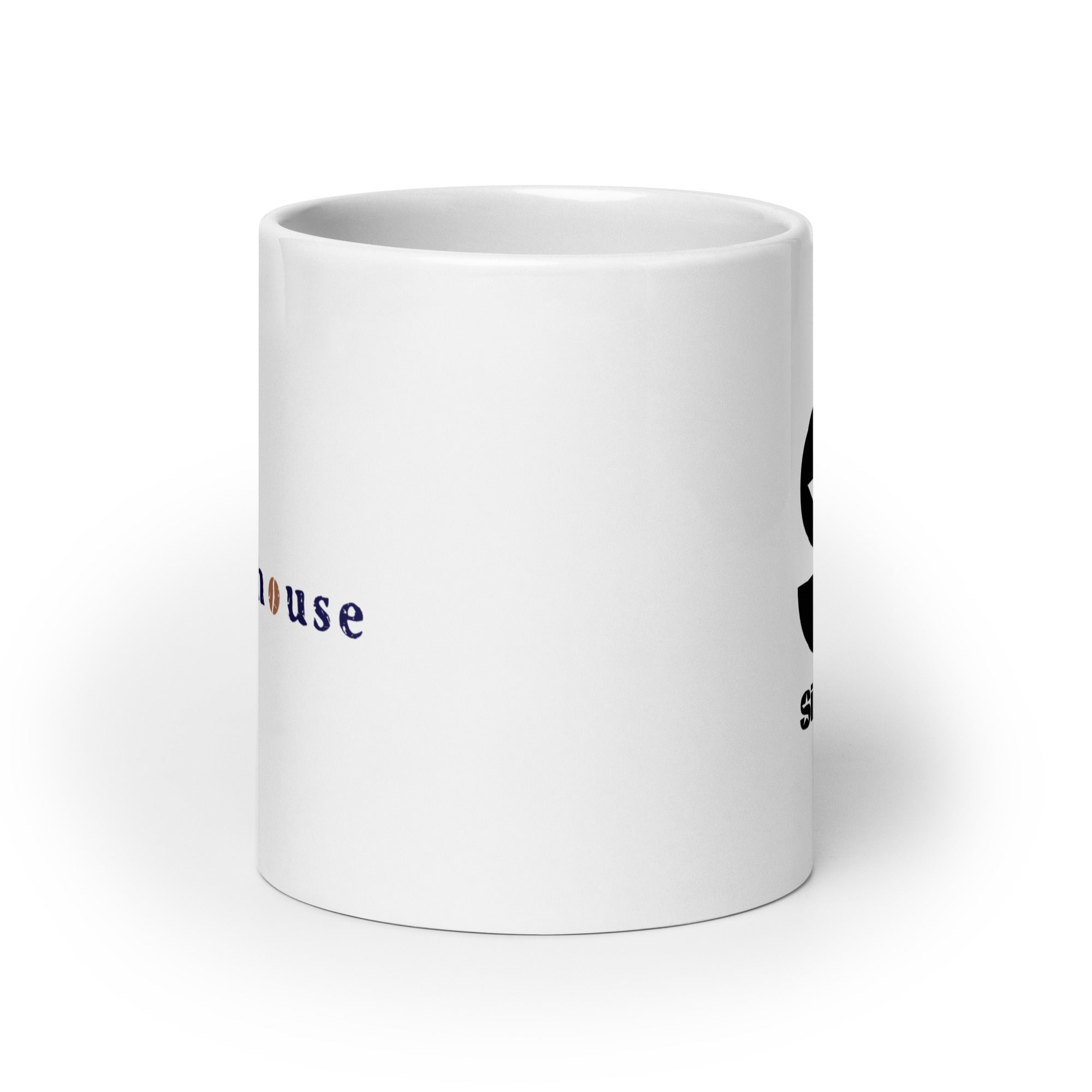 White ceramic mug. View opposite of handle.