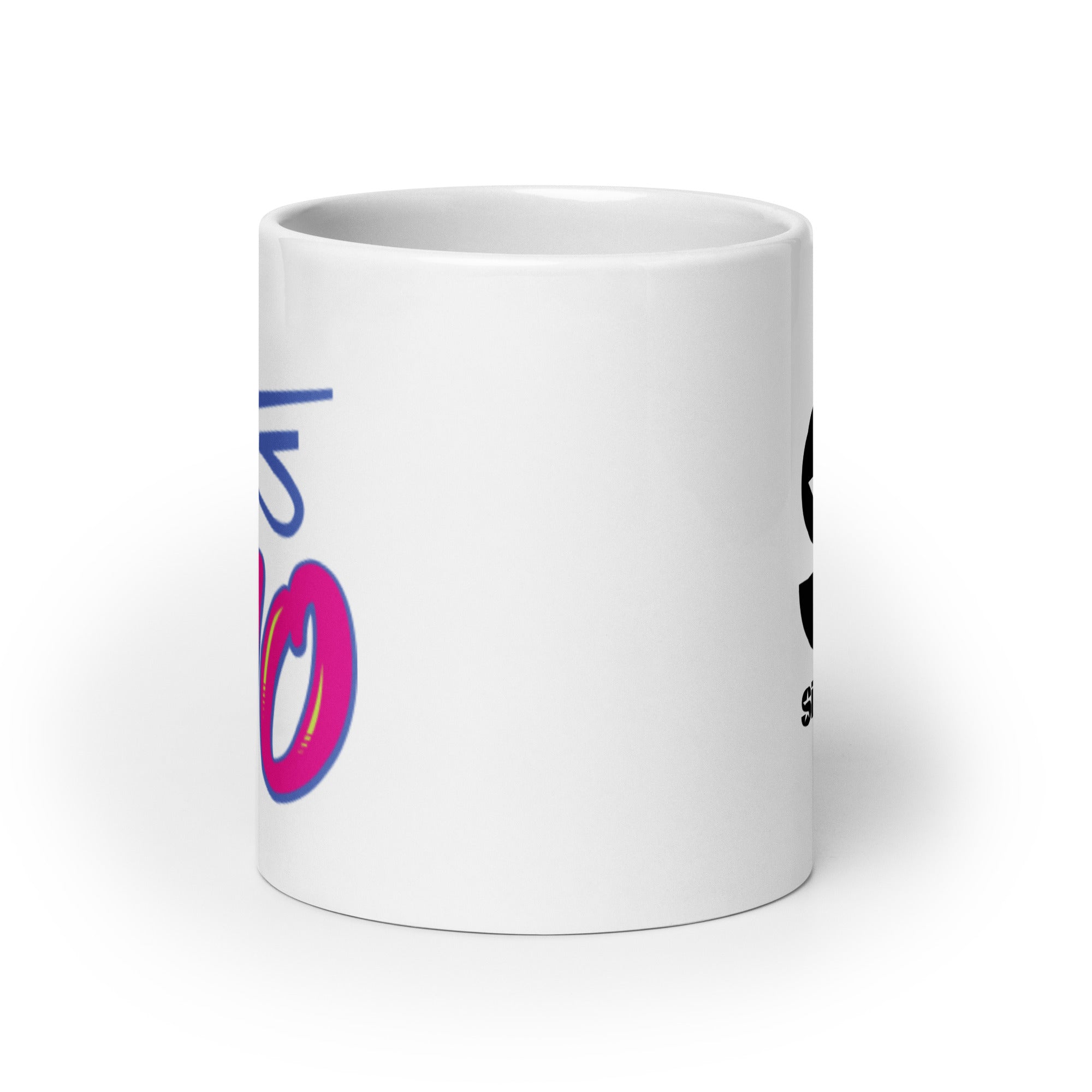 White mug. View opposite handle.