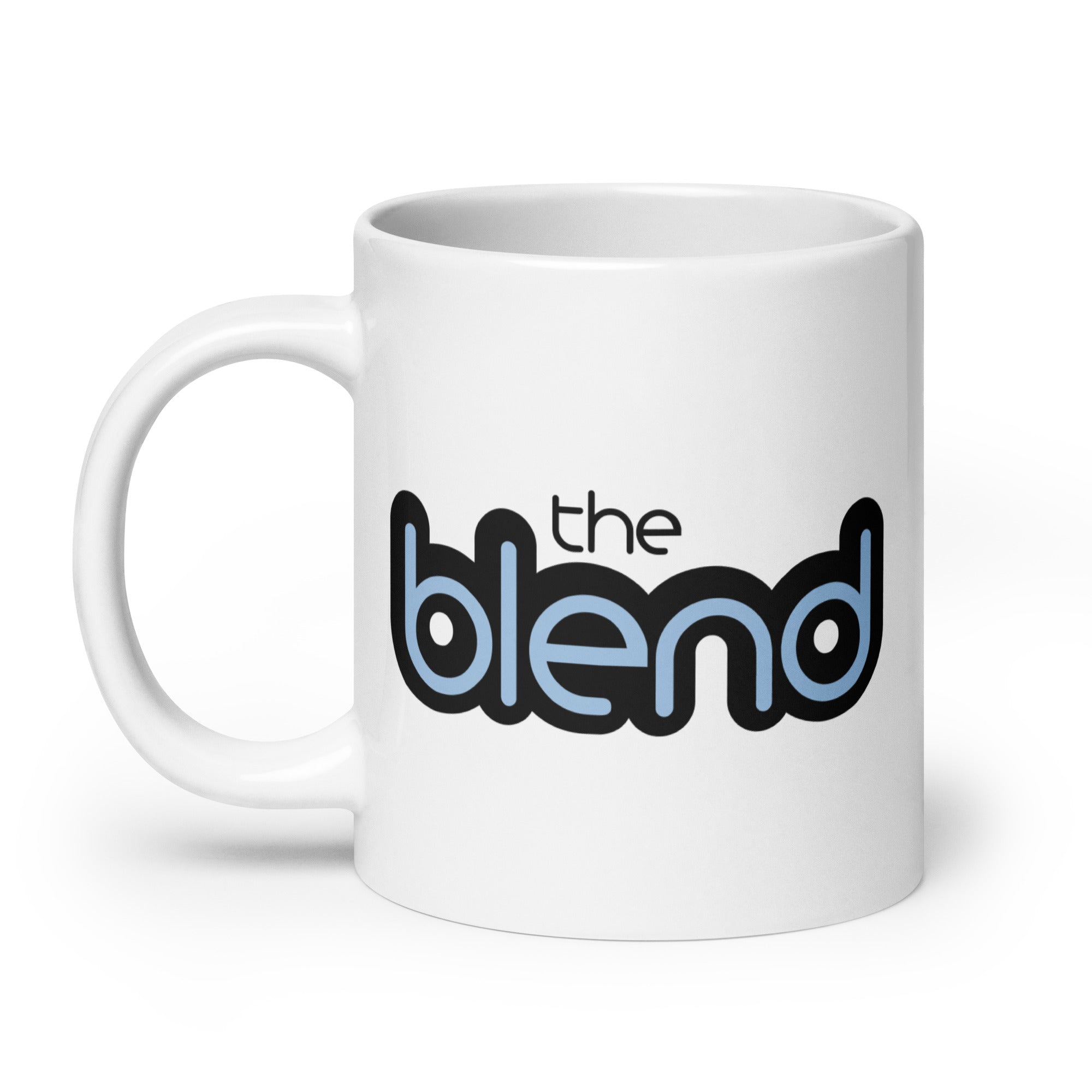 Coffee mug featuring the text 'the blend' in black and blue stylized font on a white background.