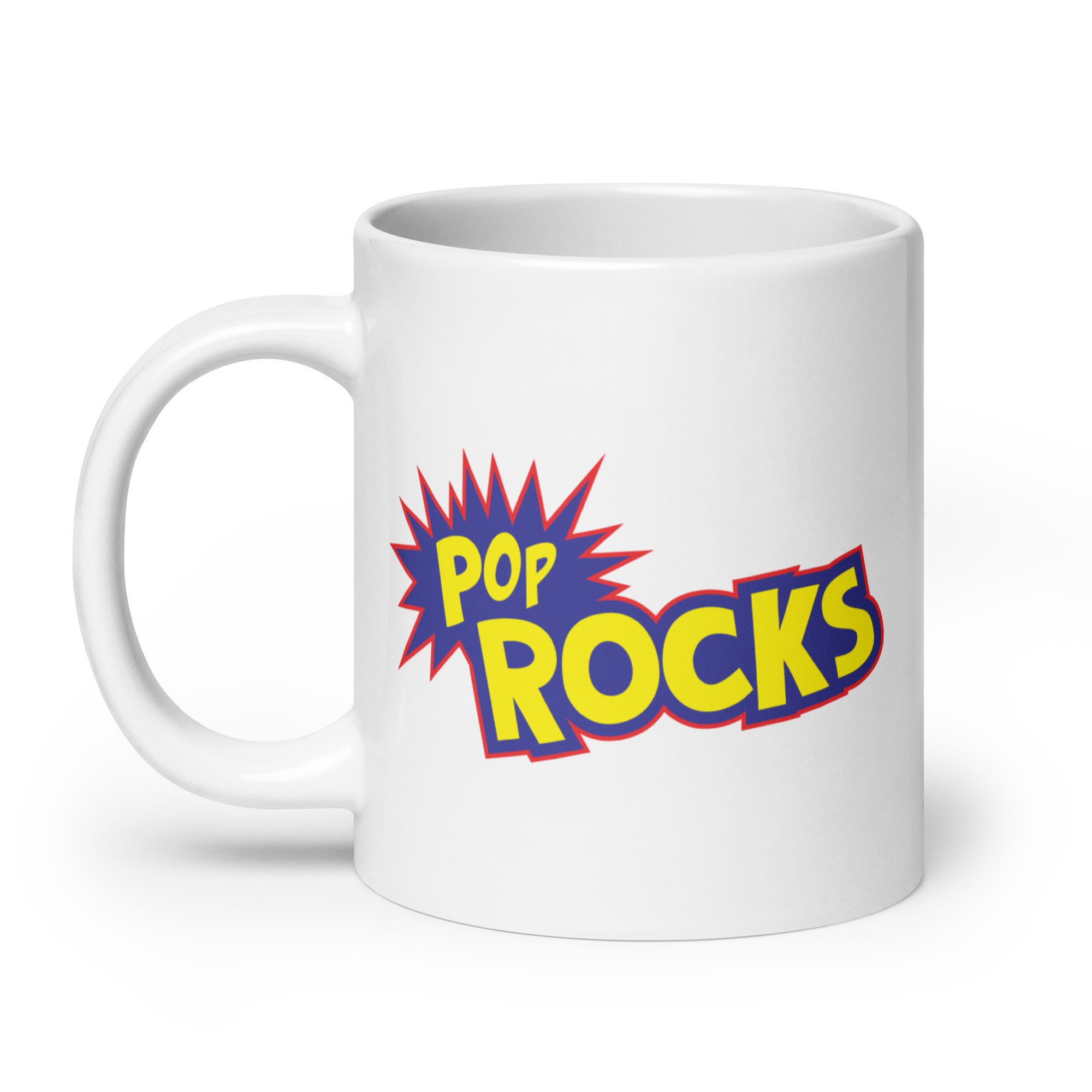 White mug with the text 'POP ROCKS' in blue, yellow and red. A playful lettering and a starburst design.