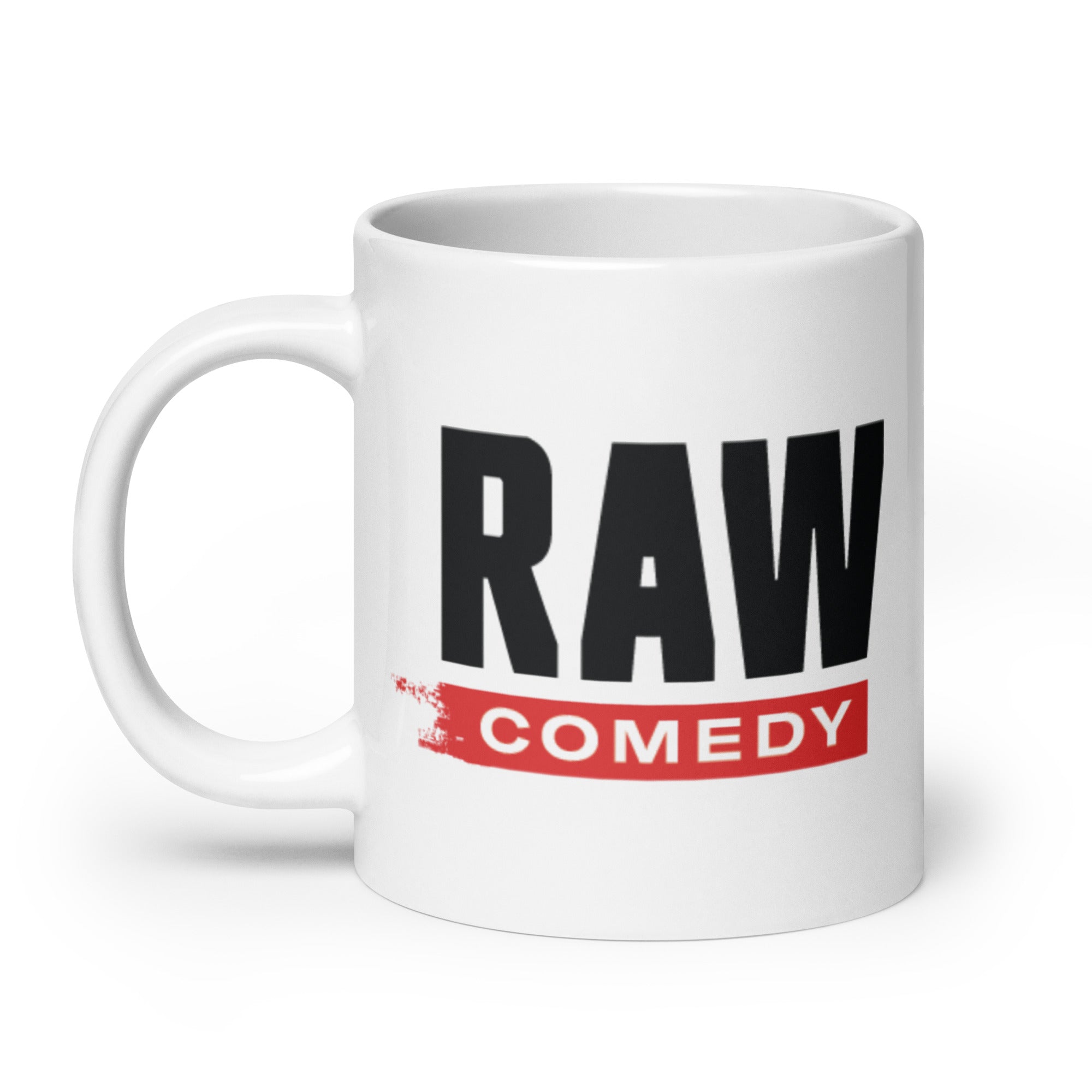 White mug with bold text: 'RAW' in black and 'COMEDY' in red.