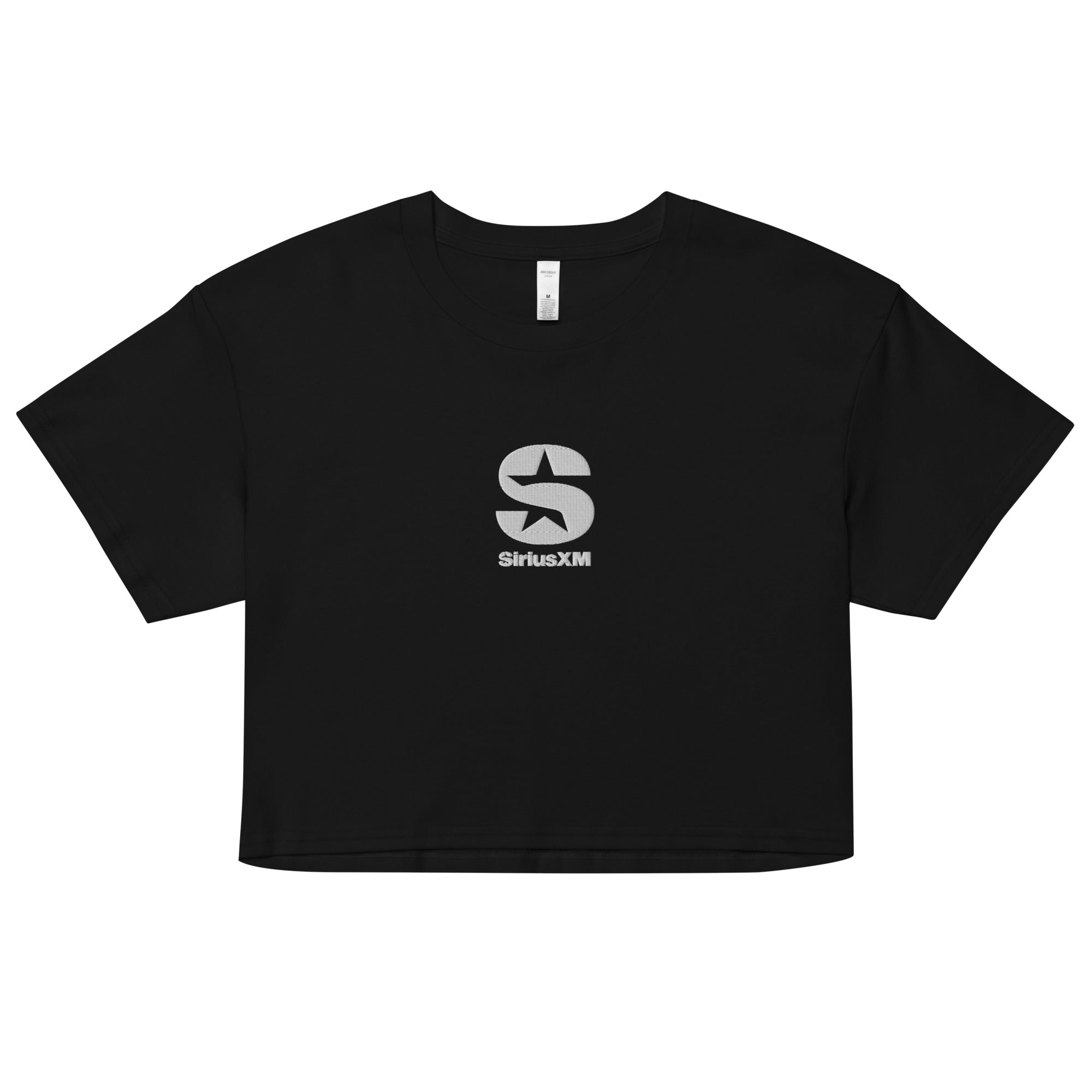 A standalone image of the black 'SiriusXM' crop top, showcasing its wide fit, short sleeves, and white embroidered logo.